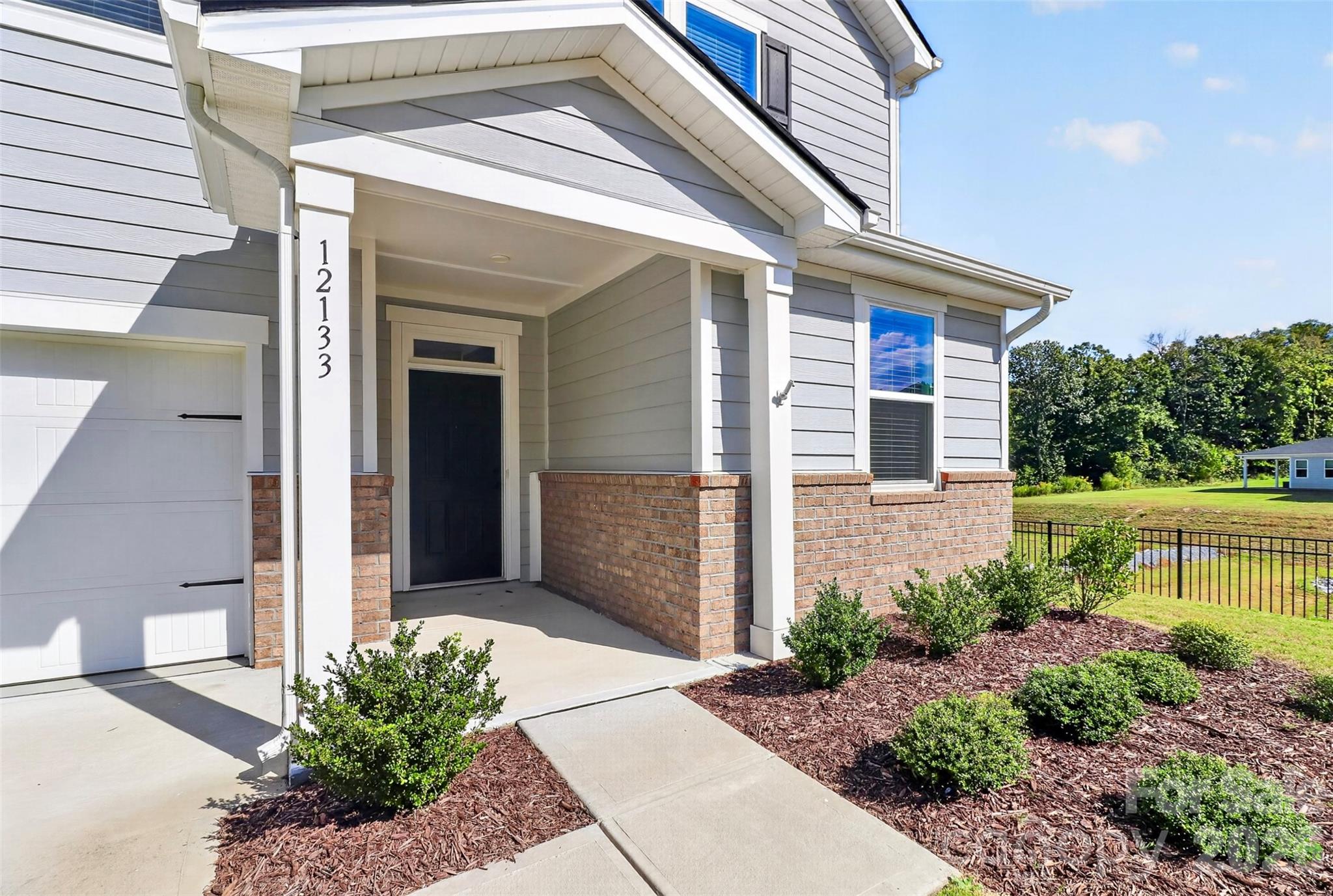 Single Family Residence at 12133 Rowan Hill Drive, Huntersville, photo 3 of 37