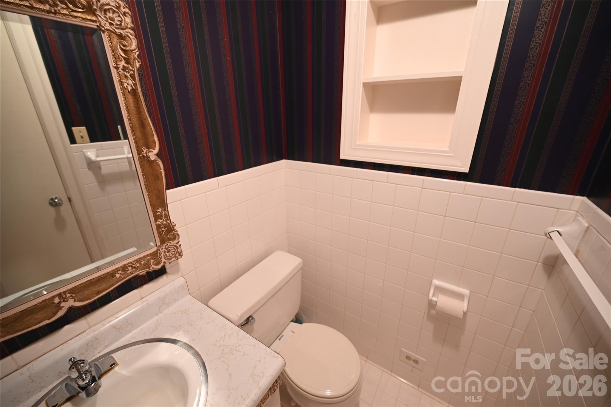 Lower level half bath - 1308 Laurel Street NE, Valdese