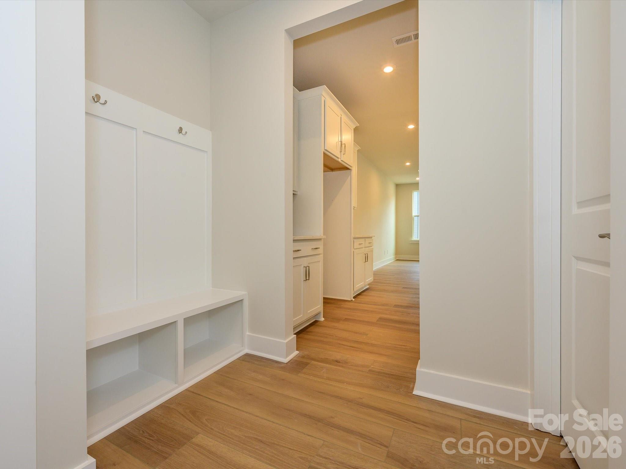 Built-In Drop Zone at Garage Entry to Make Busy Mornings and Evenings a Breeze. - 217 Halemarg Drive, Belmont