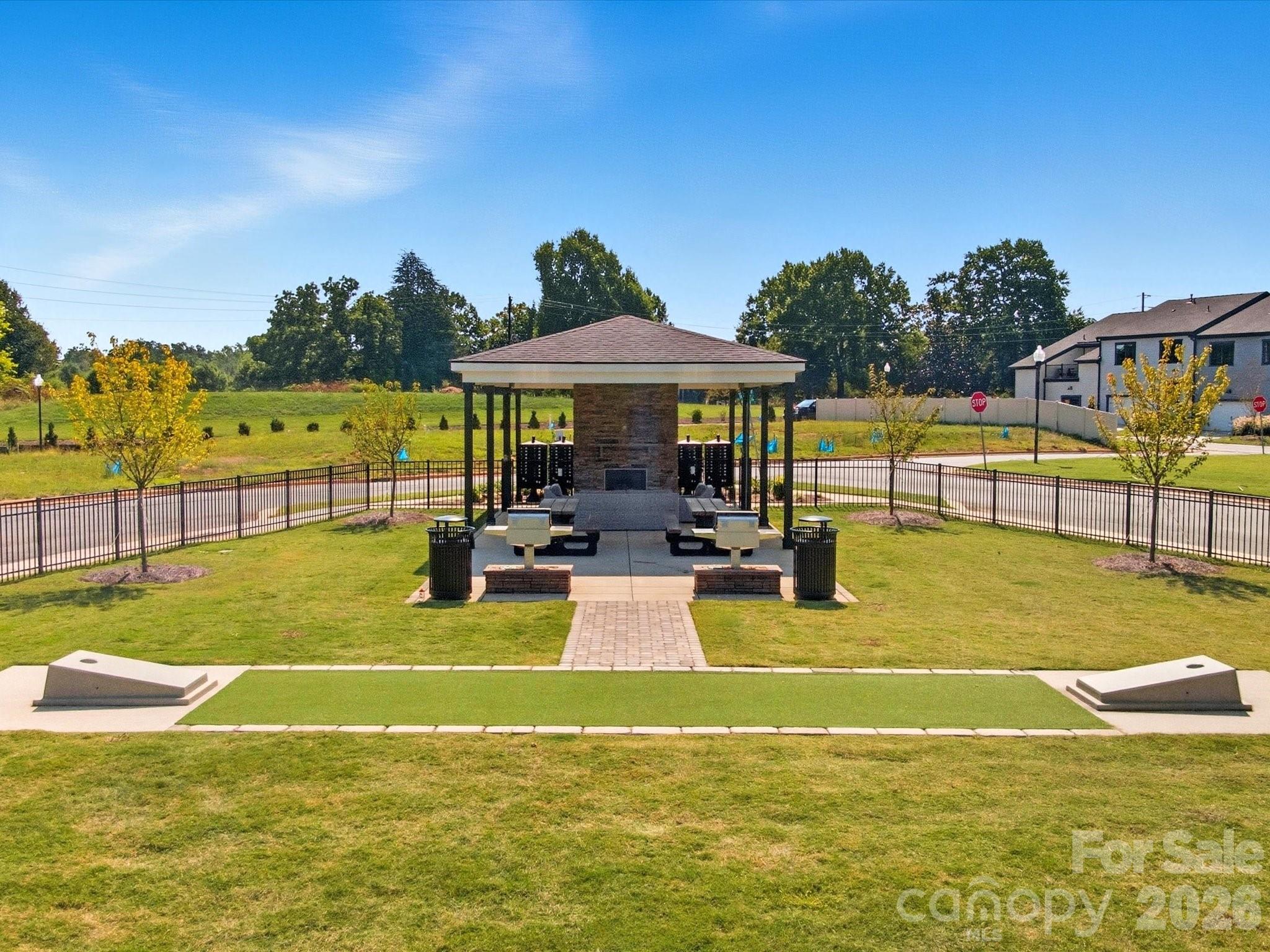 Community Amenity Including Grills, a Lounge, and Bags Game. - 217 Halemarg Drive, Belmont