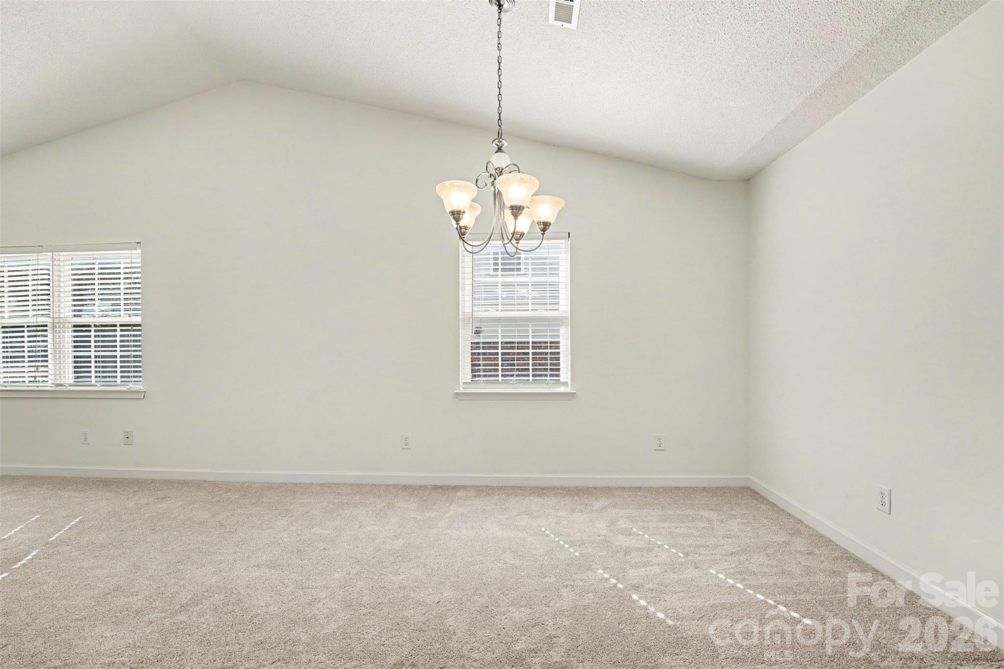 Dining Area with Chandelier - 108 Bevington Way, Mooresville