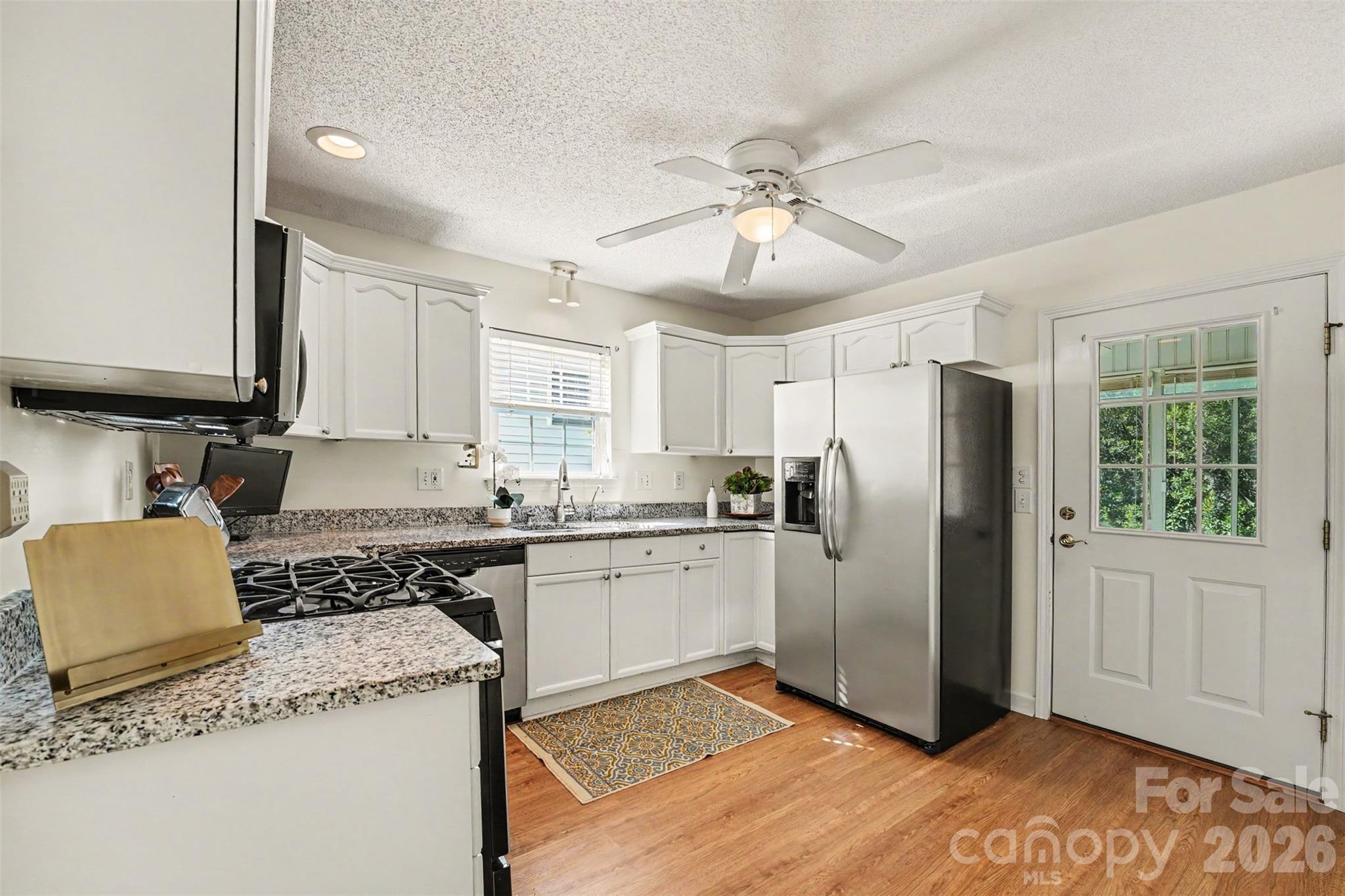 Kitchen Leads to the Bright and Sunny Sunroom - 108 Bevington Way, Mooresville