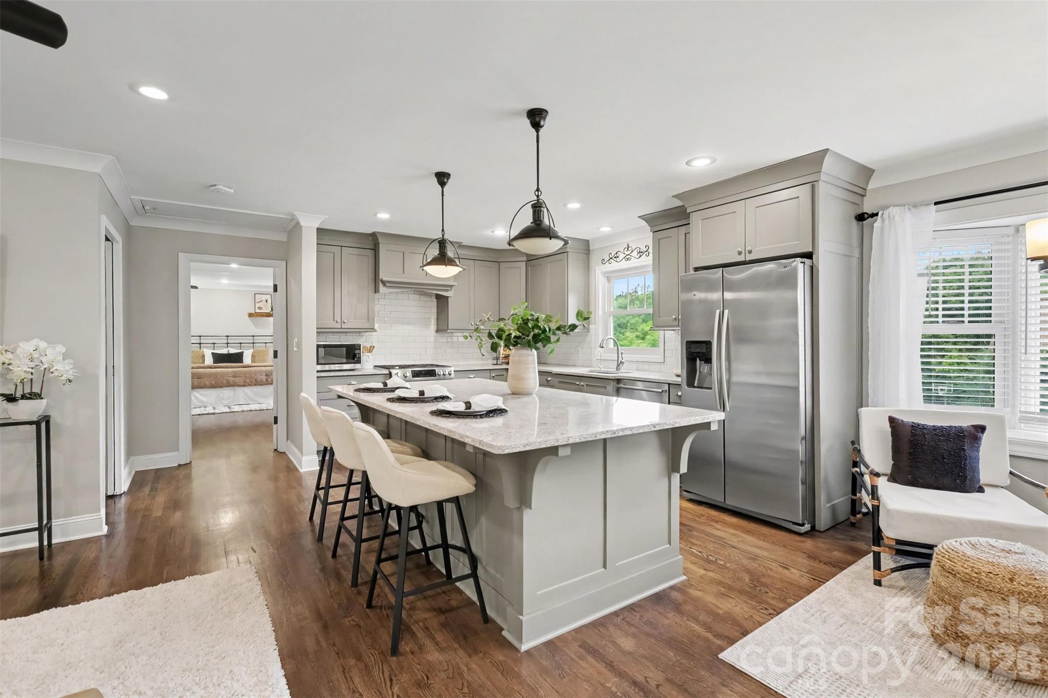 Open kitchen to dining and living room - 21334 Sandy Cove Road, Cornelius
