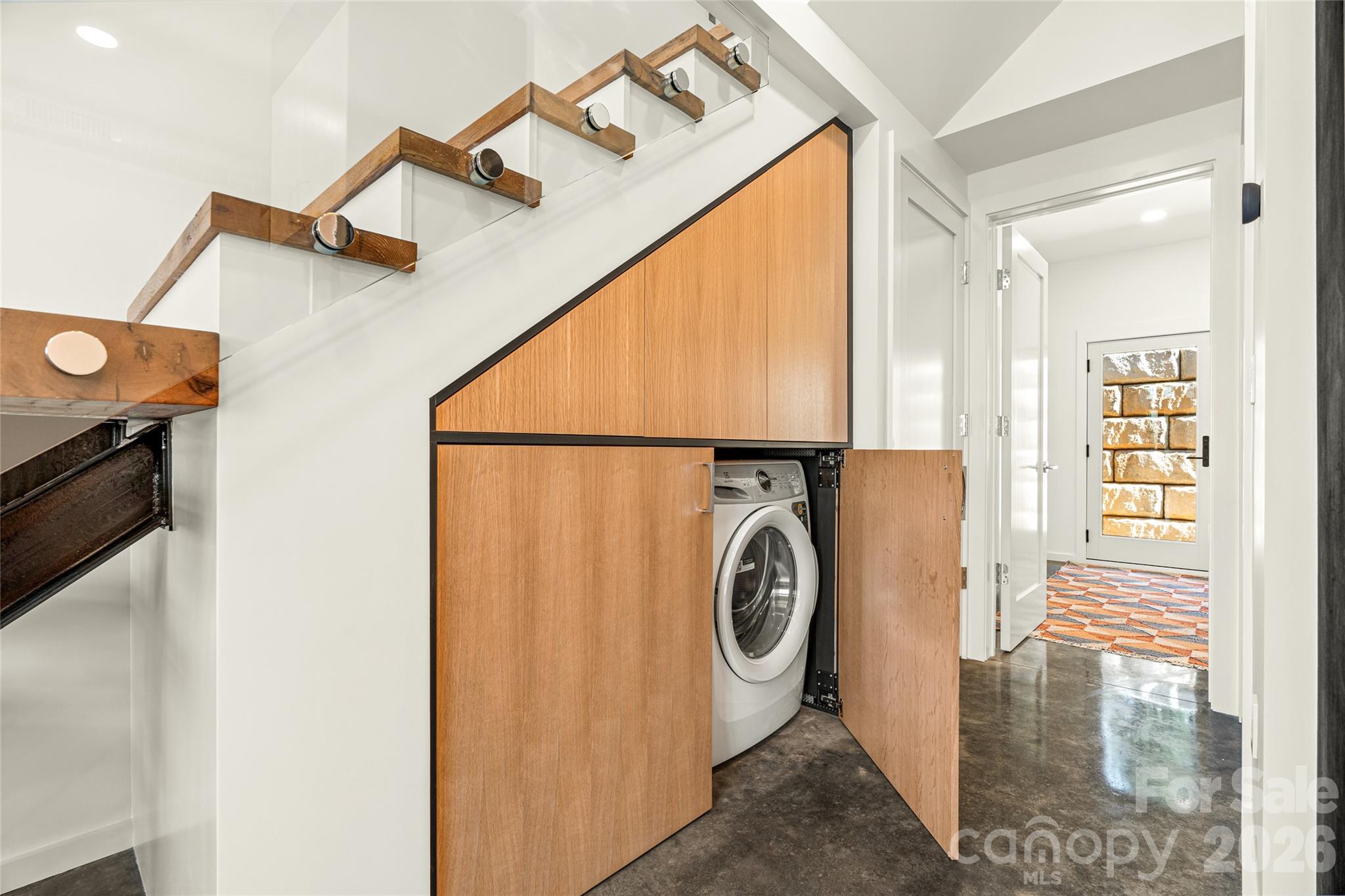 Smart built in cabinetry hides your washer and dryer. - 6 Roberts Street, Asheville