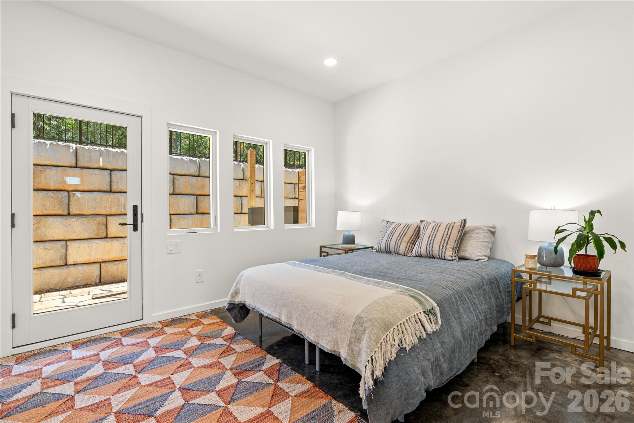 Lower level bedroom opens onto Tennessee flagstone patio. - 6 Roberts Street, Asheville