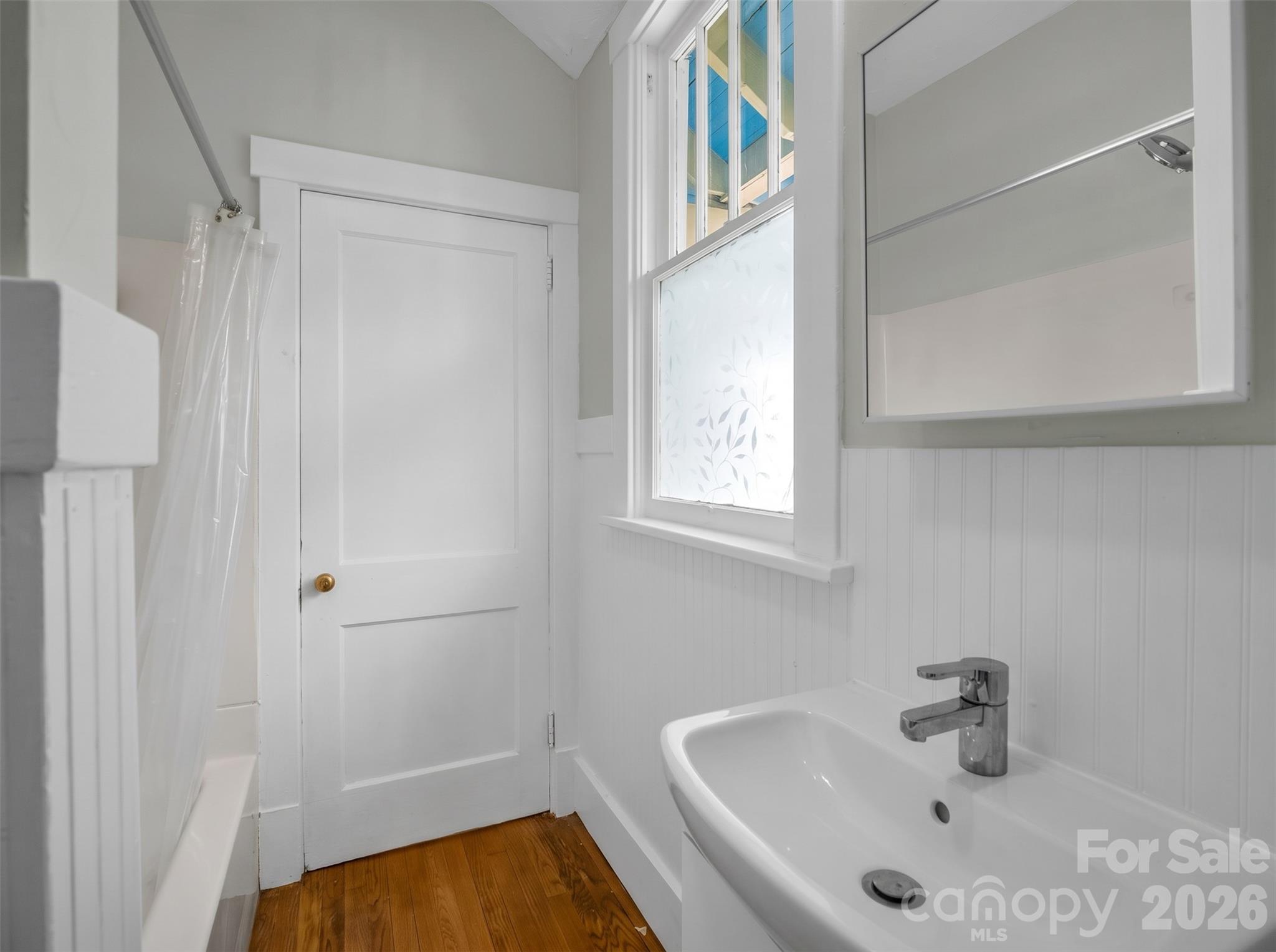 200 main floor bathroomDigitally enhanced - 198 & 200 Courtland Place, Asheville