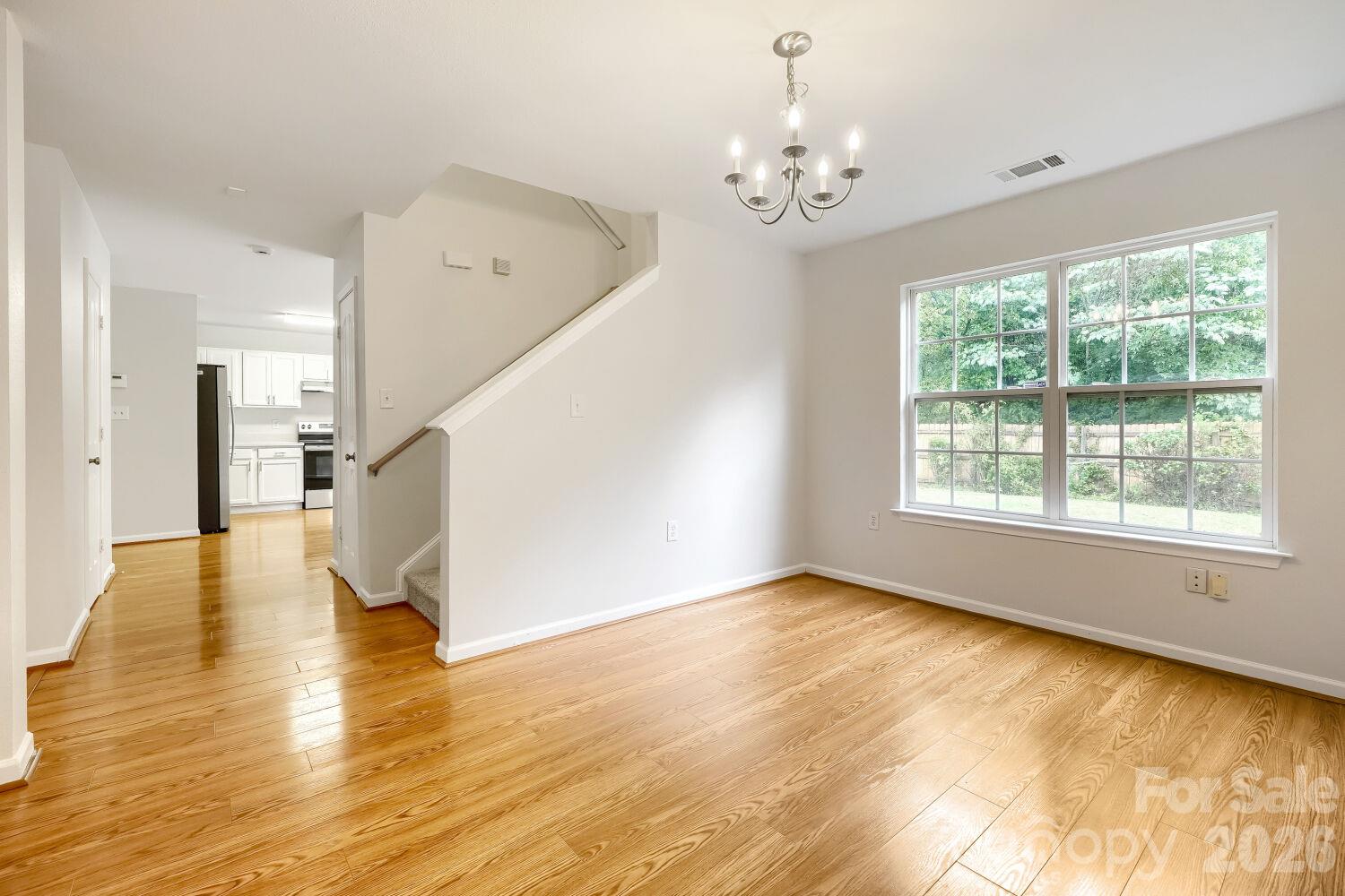 Formal Dining Room with Hallway view to Kitchen - 5135 Raspberry Knoll Drive, Charlotte