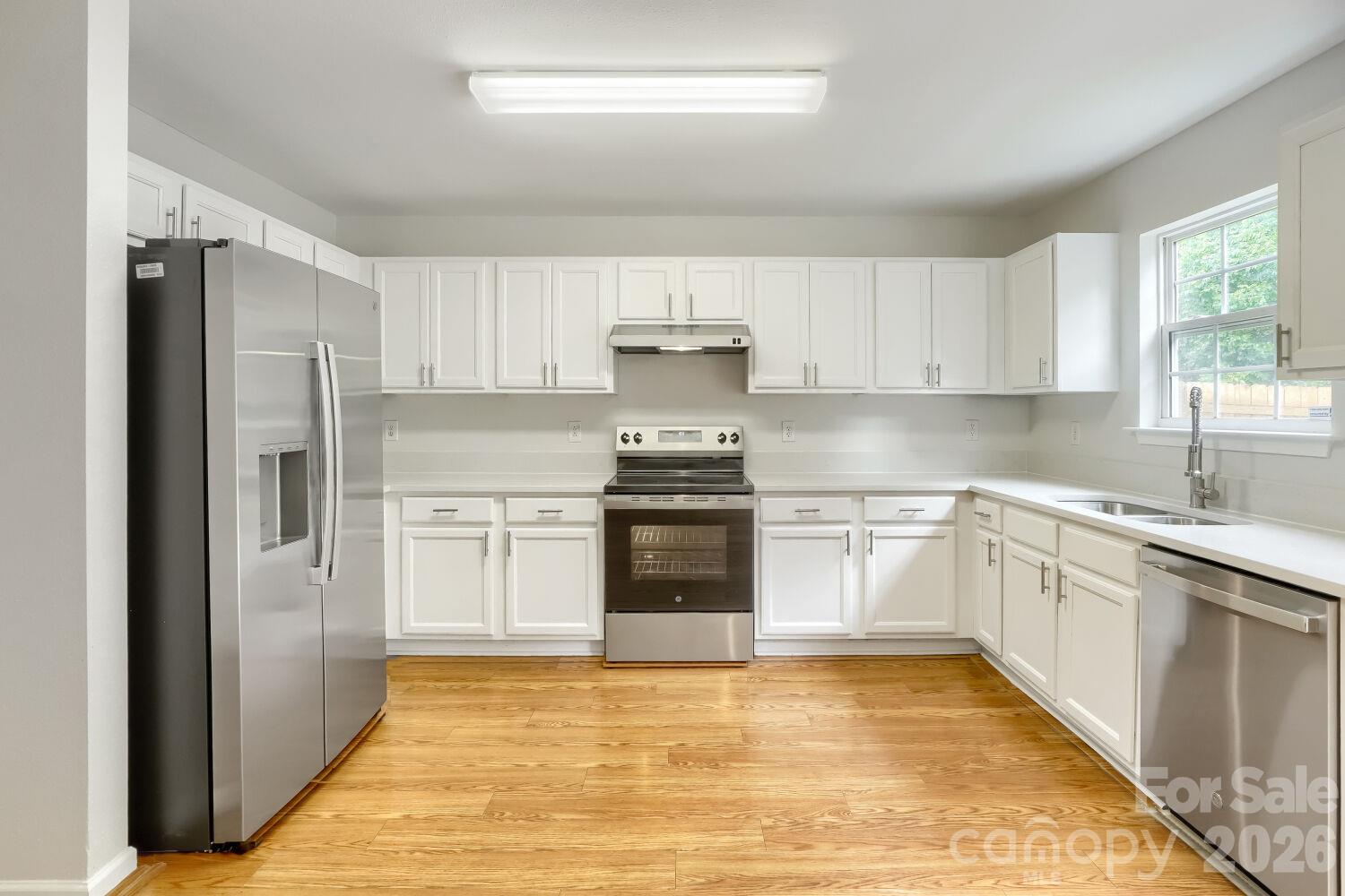 Kitchen with all New Stainless Steel Appliances, Lots of Cabinets & Counterspace - 5135 Raspberry Knoll Drive, Charlotte