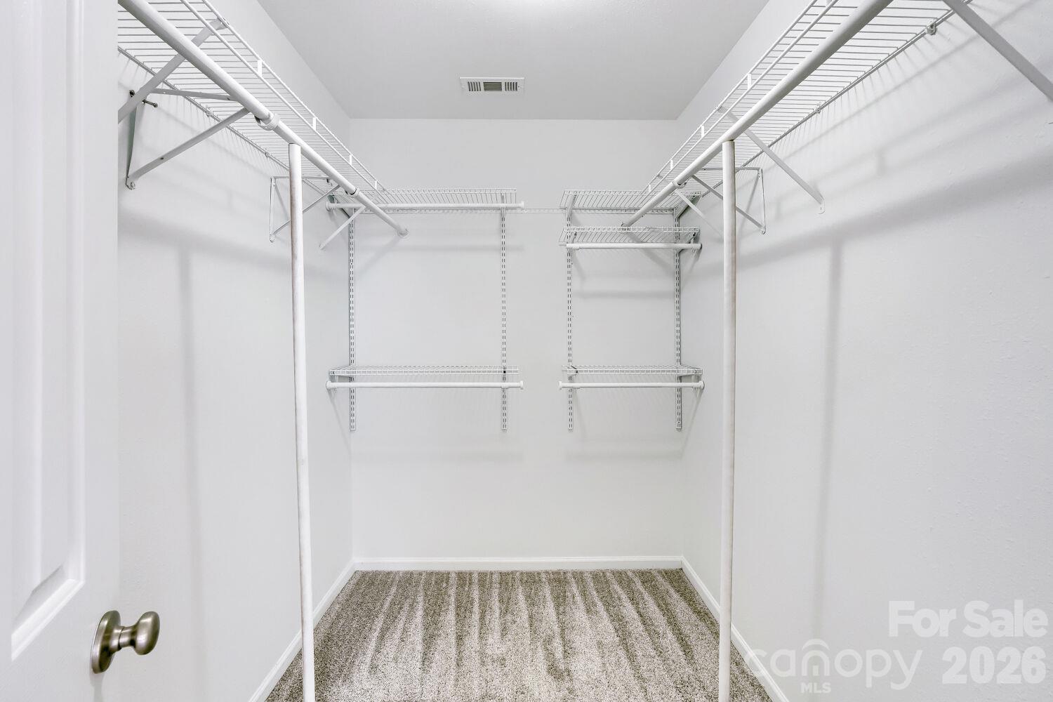 Primary Suite Walk-In-Closet with shelving - 5135 Raspberry Knoll Drive, Charlotte