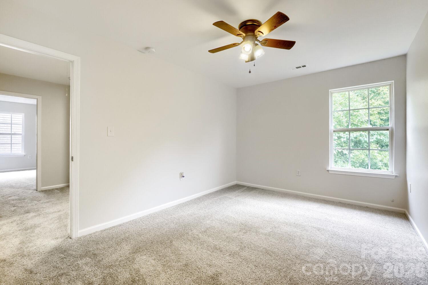 Bedroom 3 on the Upper Level, New Carpet & with Ceiling Fan - 5135 Raspberry Knoll Drive, Charlotte