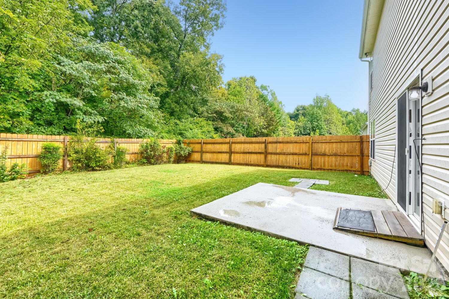 Fenced in Backyard with patio - 5135 Raspberry Knoll Drive, Charlotte