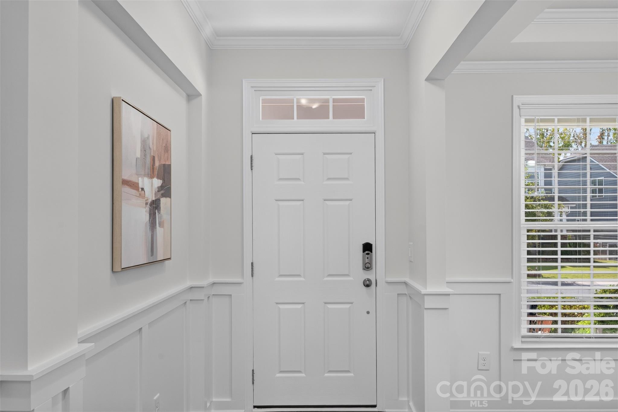 View of front door from entry hall. Dining room to the right. - 4638 Monument Valley Drive, Indian Land
