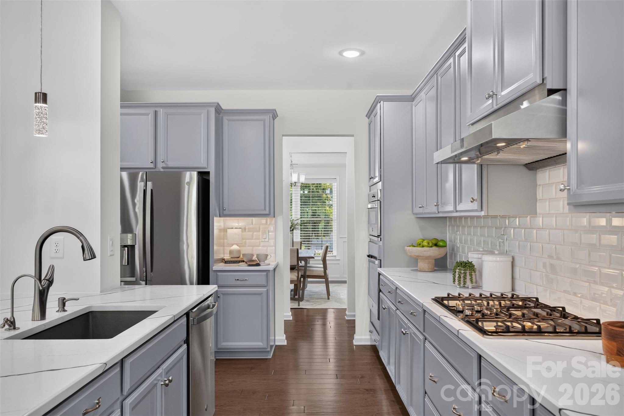 Chefs' kitchen with vented gas cooktop. - 4638 Monument Valley Drive, Indian Land