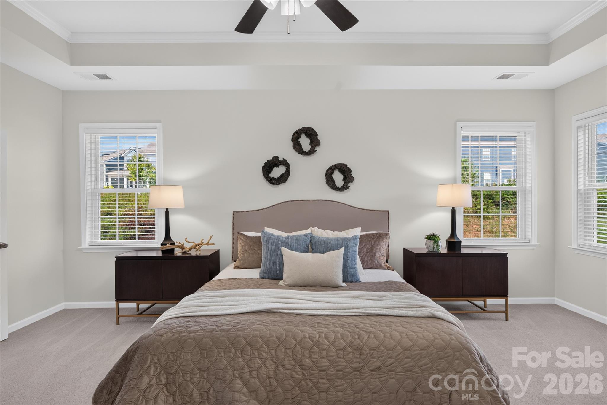 Primary bedroom suite with tray ceiling. - 4638 Monument Valley Drive, Indian Land
