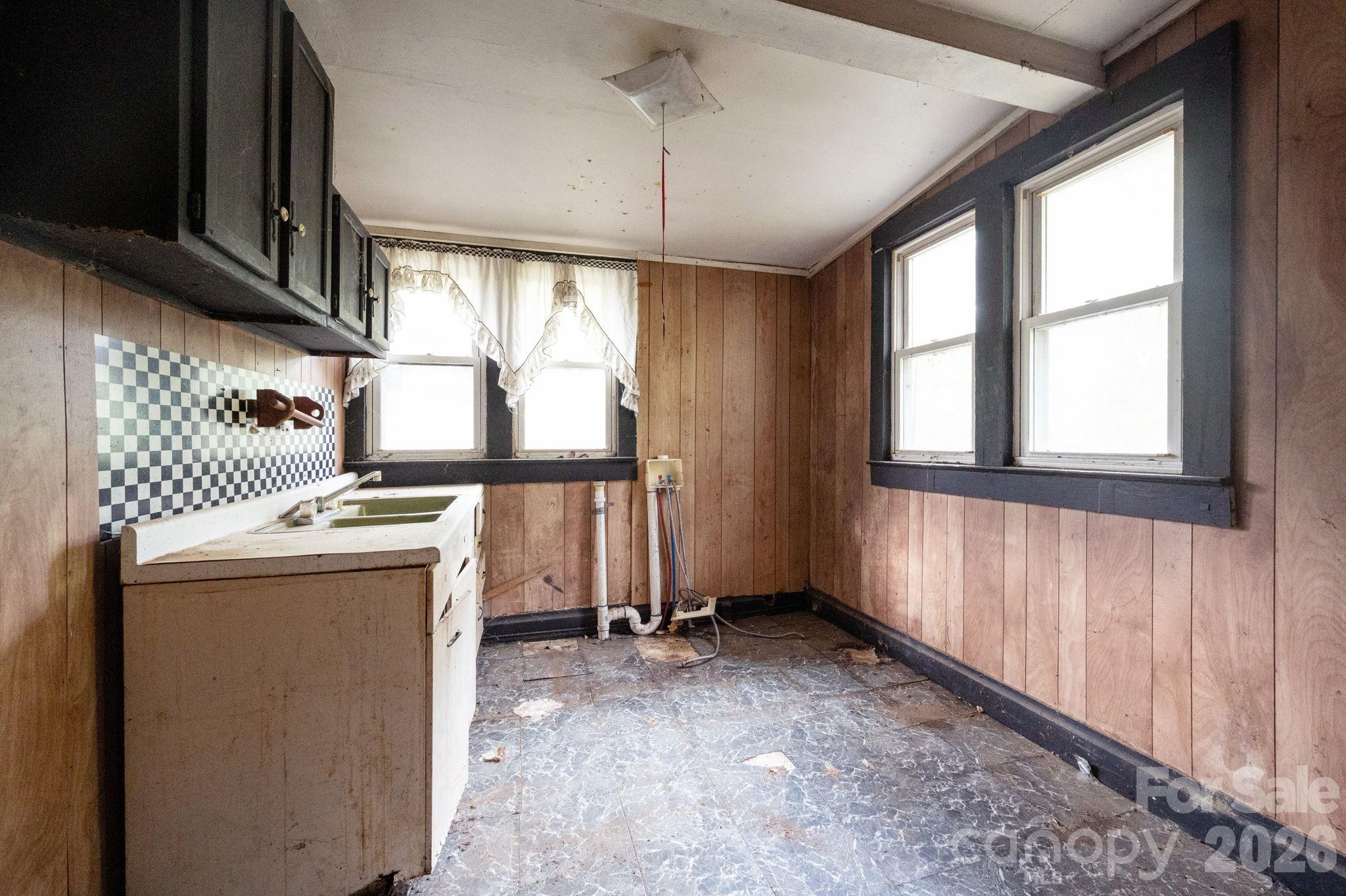Upper level current kitchen area - 125 Fairfax Avenue, Asheville