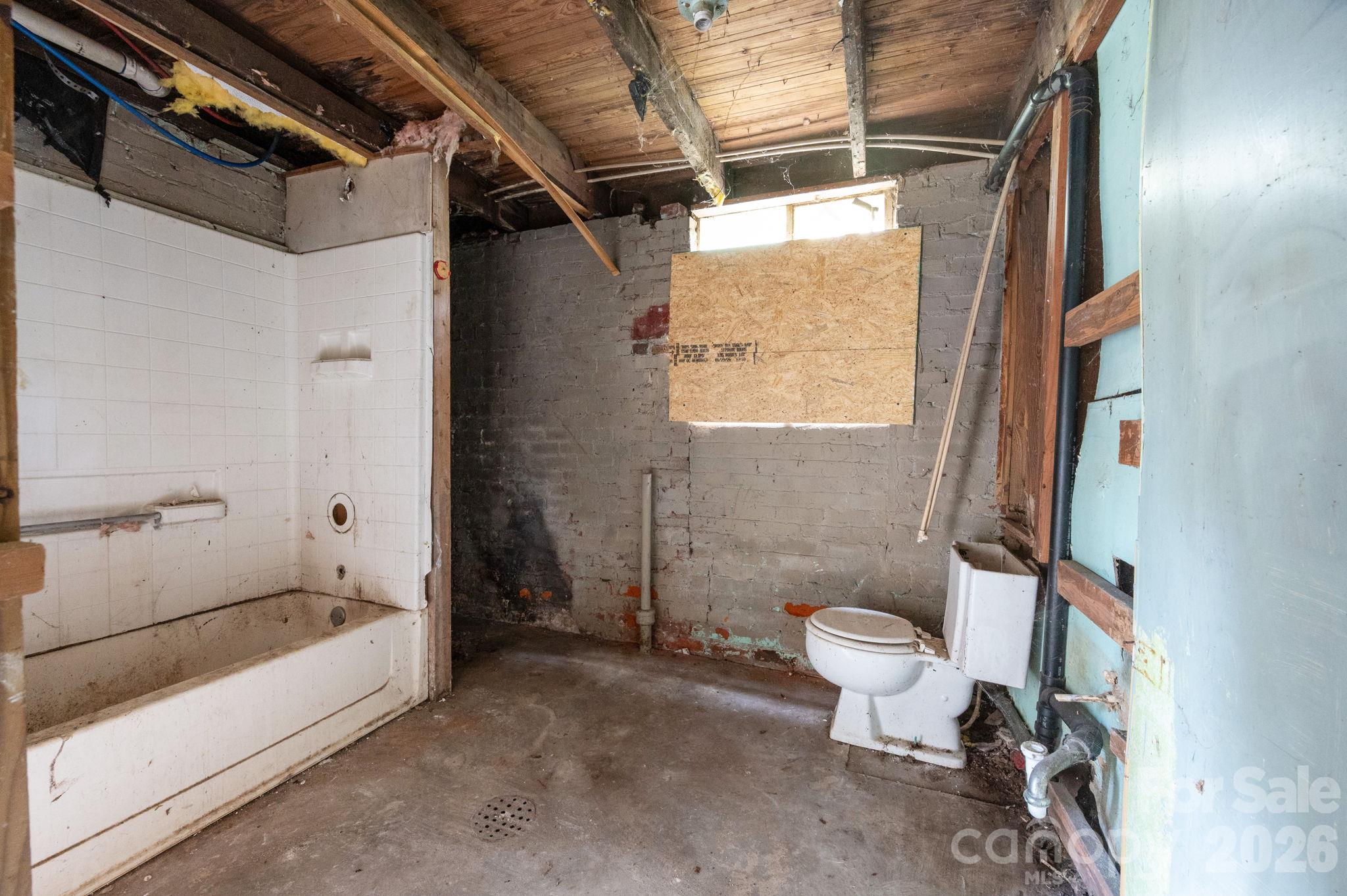 Bathroom area in current lower level - 125 Fairfax Avenue, Asheville