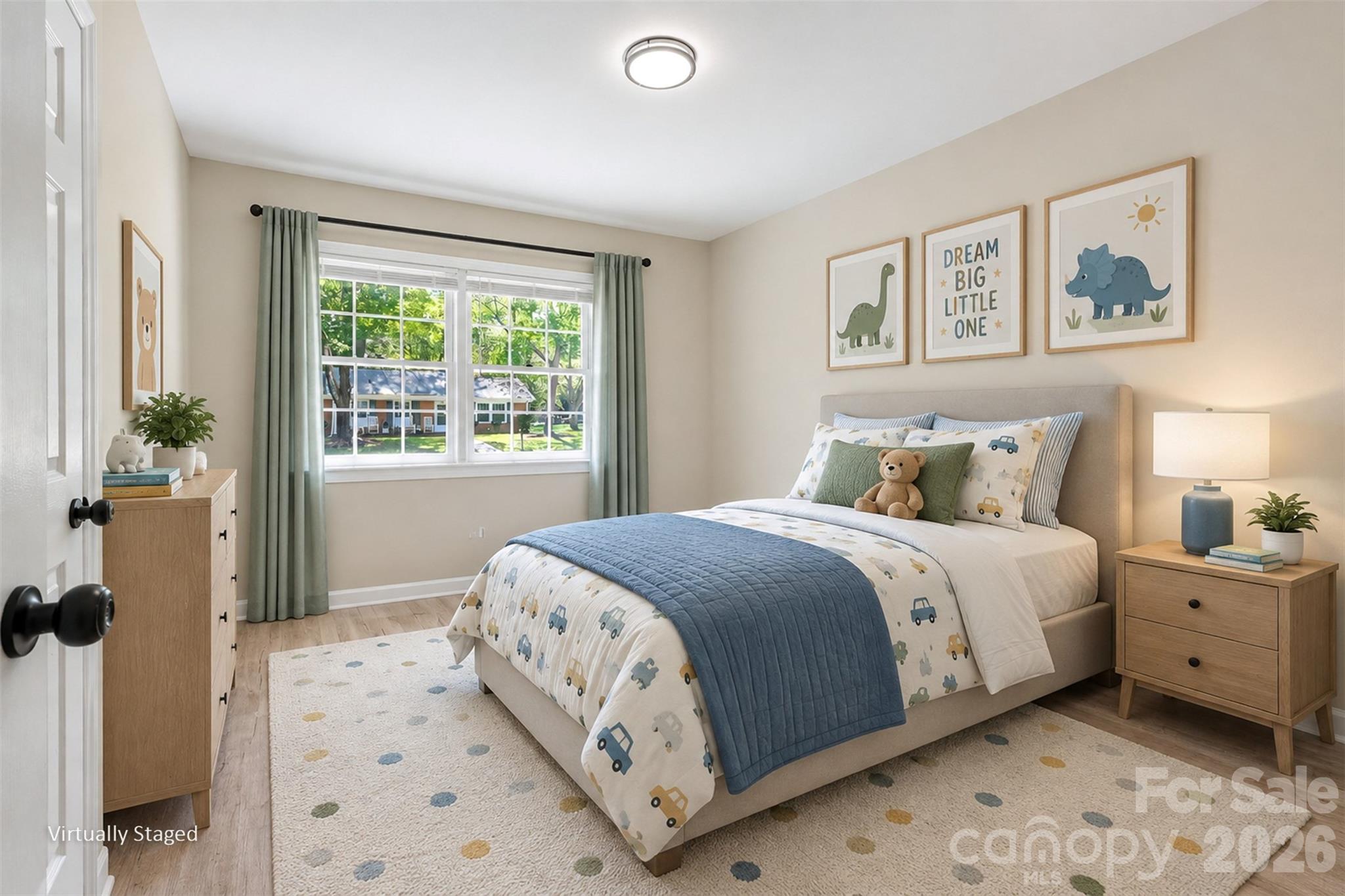 Secondary bedroom featuring fresh neutral paint, updated vinyl flooring, flush-mount lighting, and ample natural light. ( Virtually Staged) - 3801 Hillock Court, Charlotte