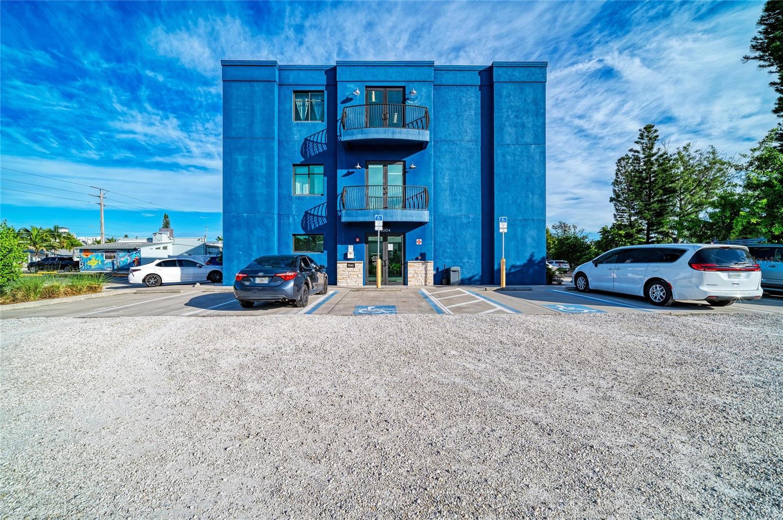 Front entrance and parking - 3004 AVENUE C, HOLMES BEACH