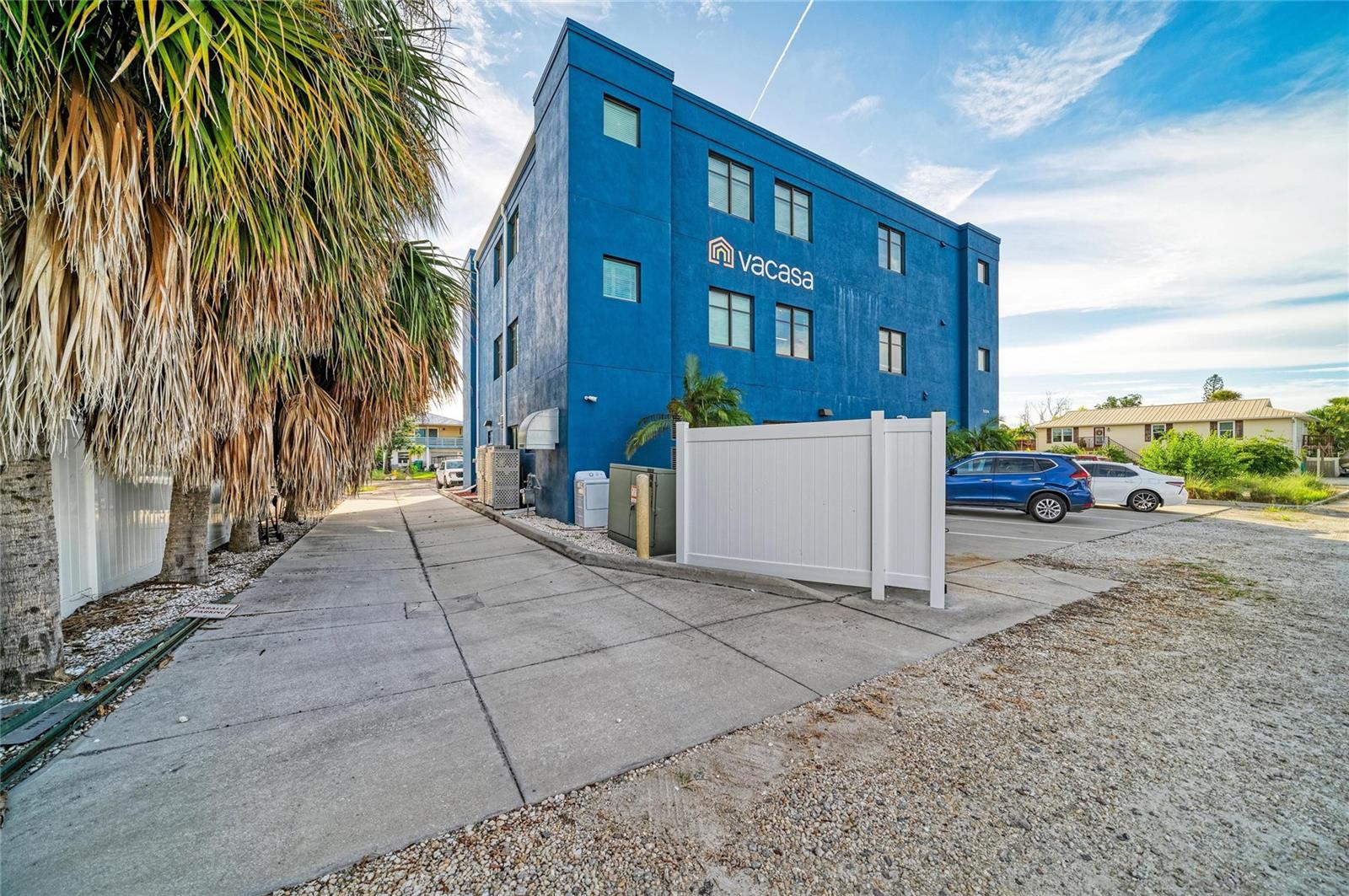 West side of building. - 3004 AVENUE C, HOLMES BEACH