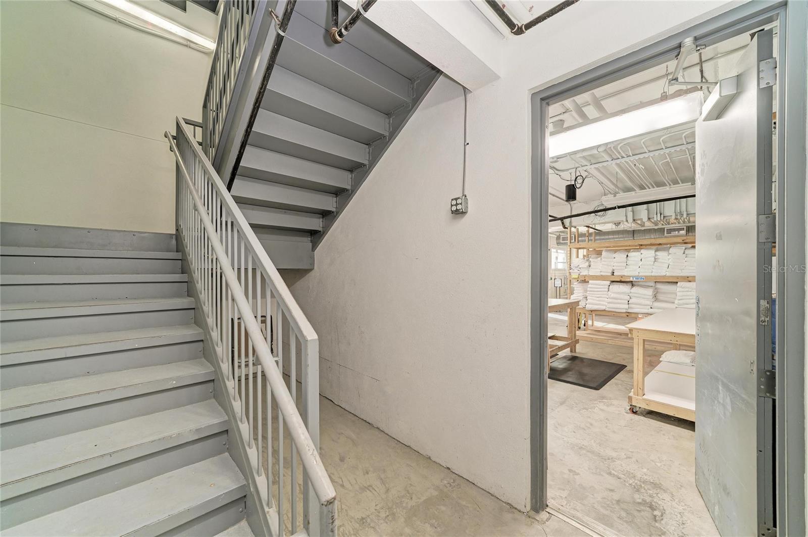 Interior egress stairs - 3004 AVENUE C, HOLMES BEACH