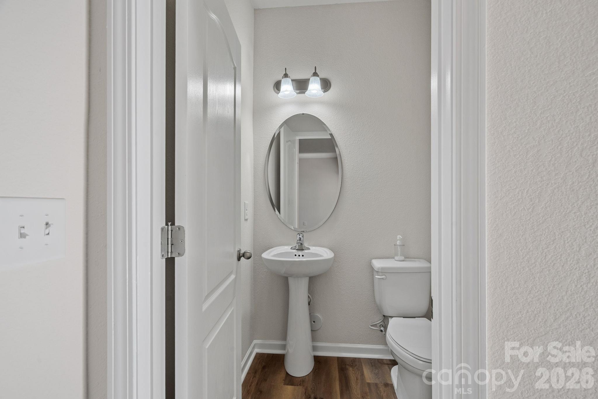 Downstairs powder room - 6215 Paw Village Road, Charlotte