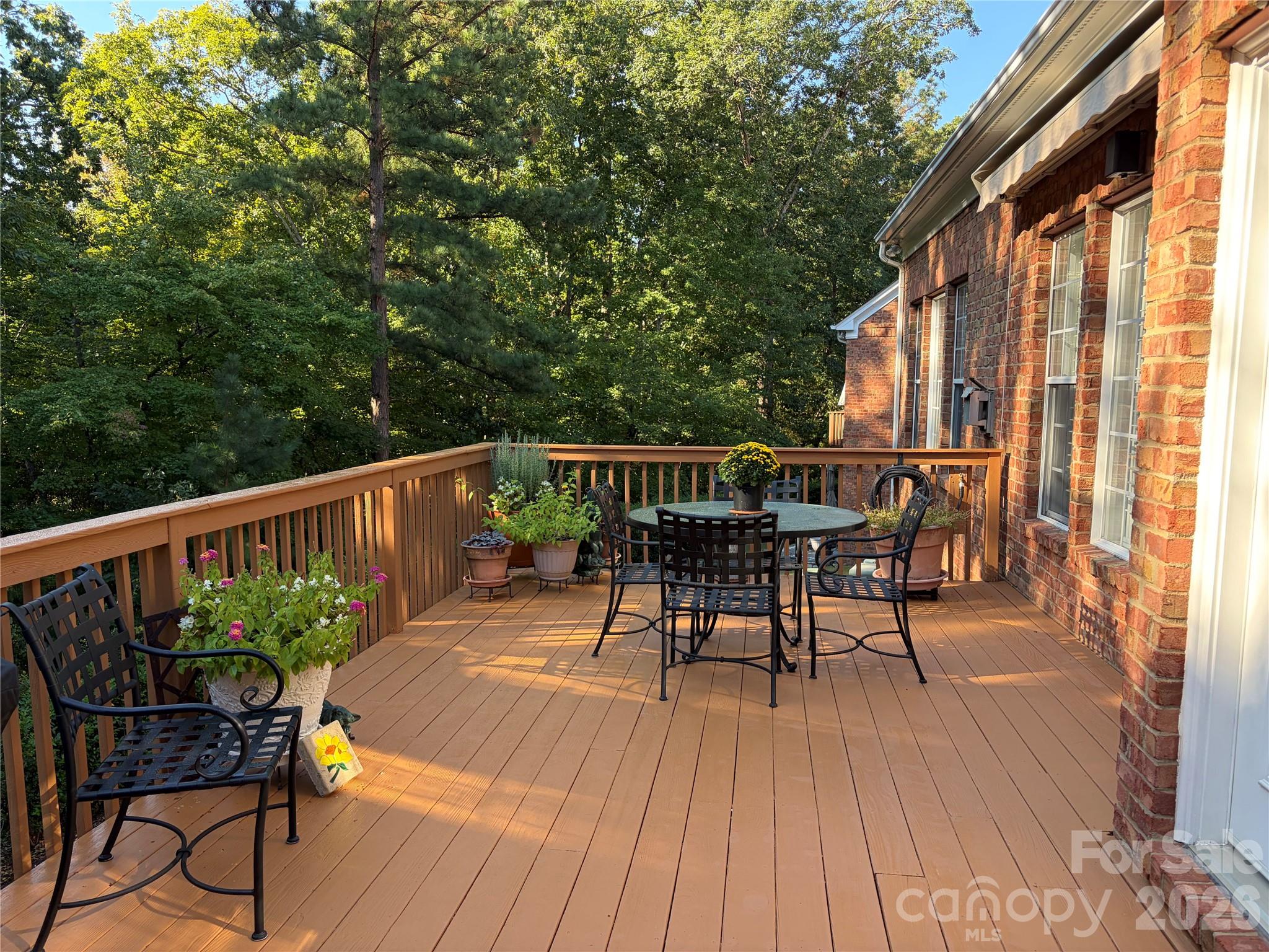 Private 20-foot deck with gas line for grill and retractable awning. - 11437 Corliss Avenue, Charlotte