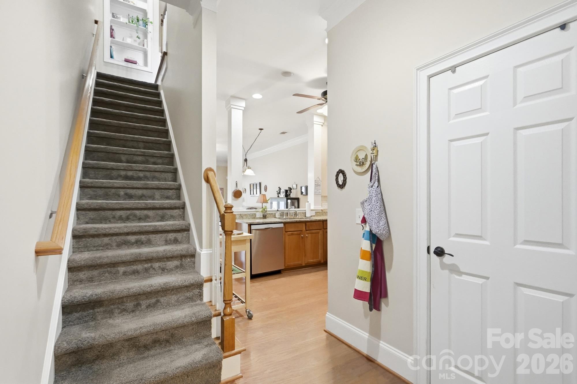 Large walk-in closet; stairs to upper level bedrooms and laundry - 427 Dumbarton Street NW, Concord