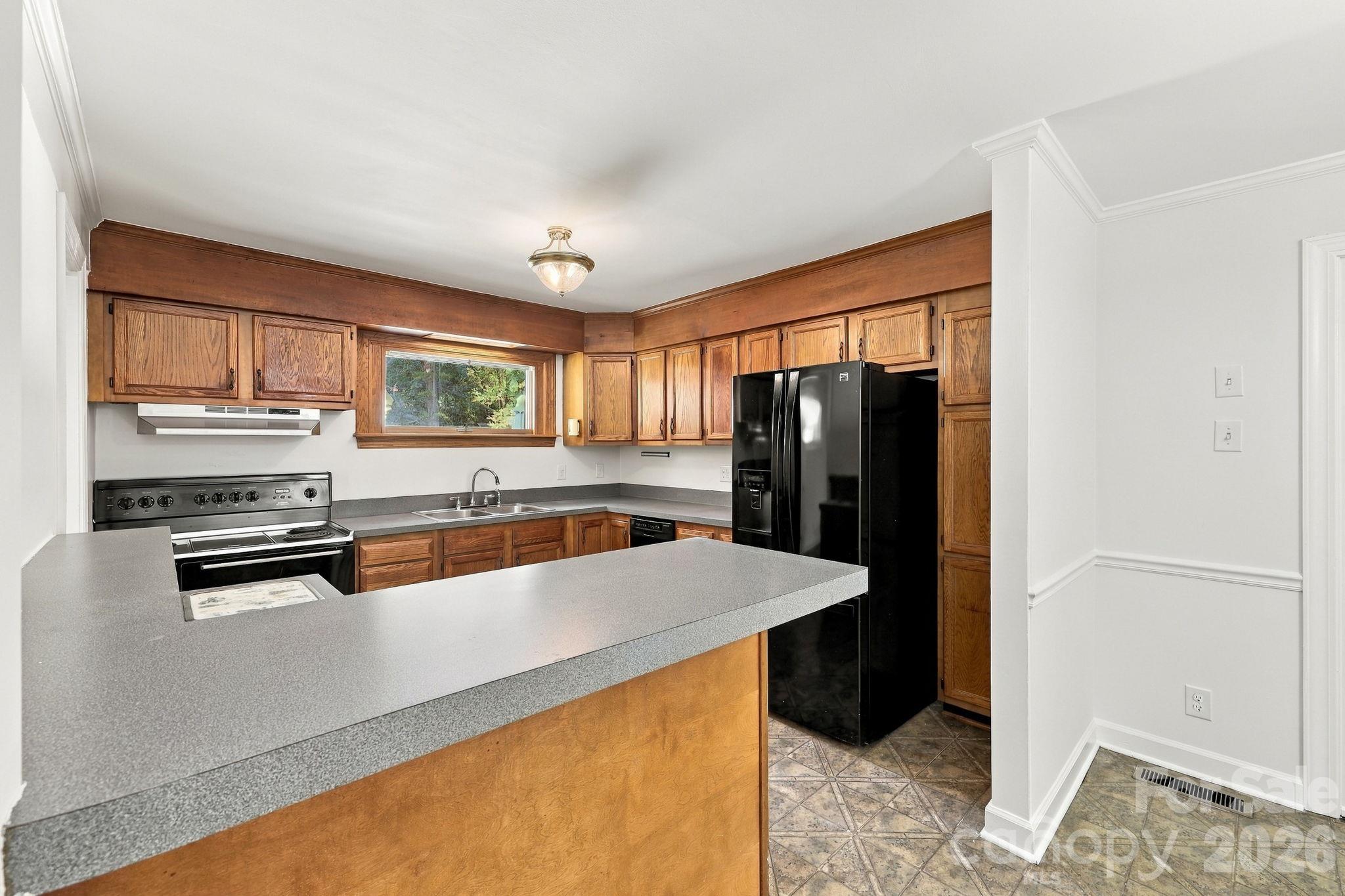 Kitchen with Fridge - 123 Hillside Avenue SW, Concord