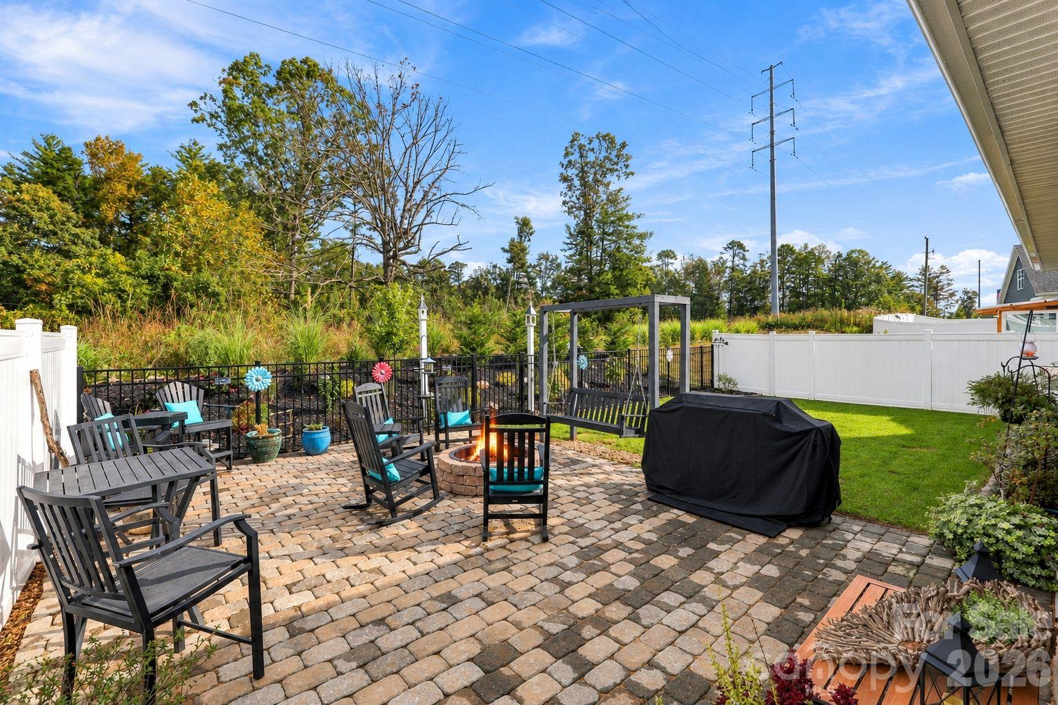 Beautiful fenced in  backyard with pavers and build in fireplace - 451 Fox Cove Cove, Hendersonville