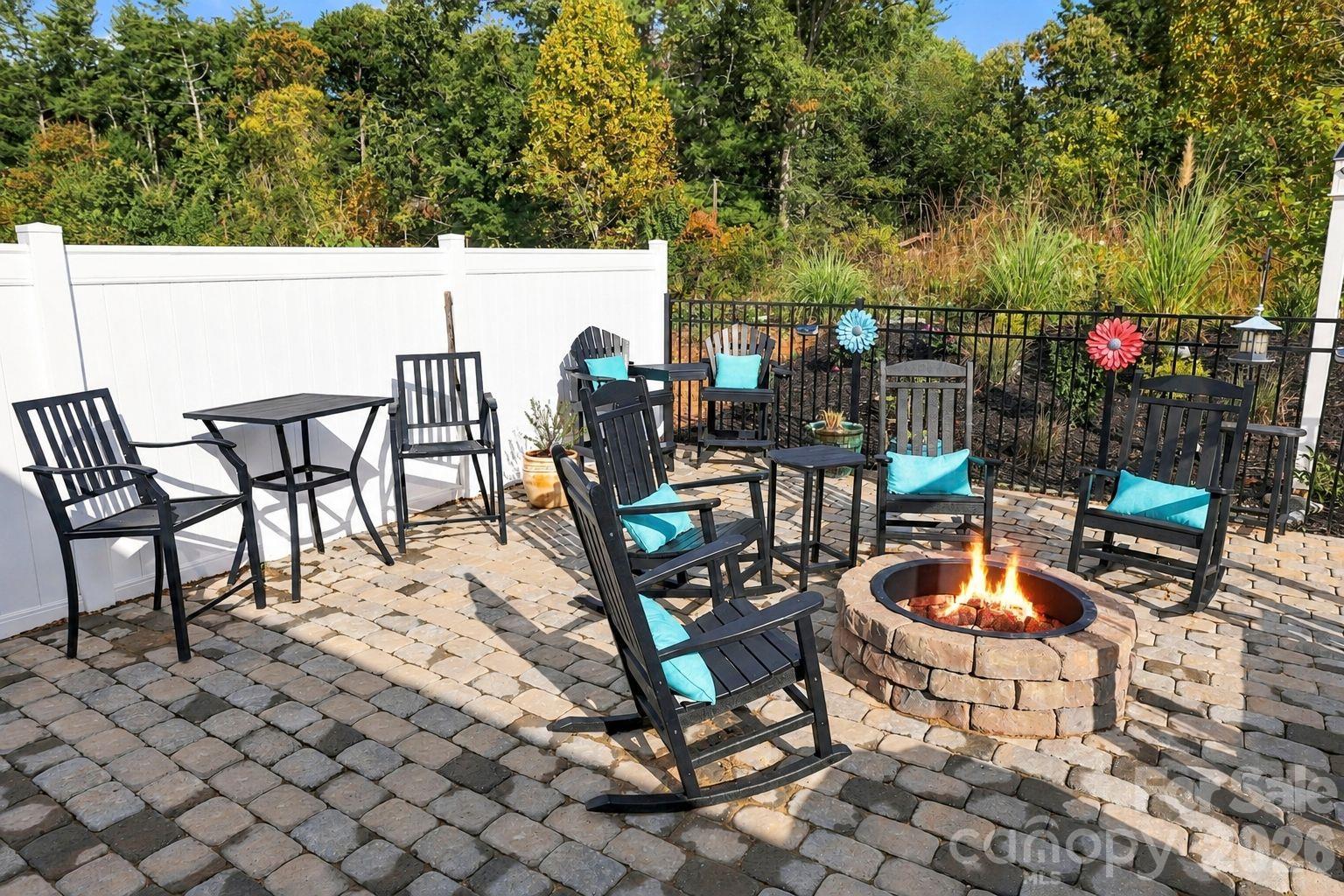 Beautiful fenced in backyard with pavers and build in fireplace - 451 Fox Cove Cove, Hendersonville