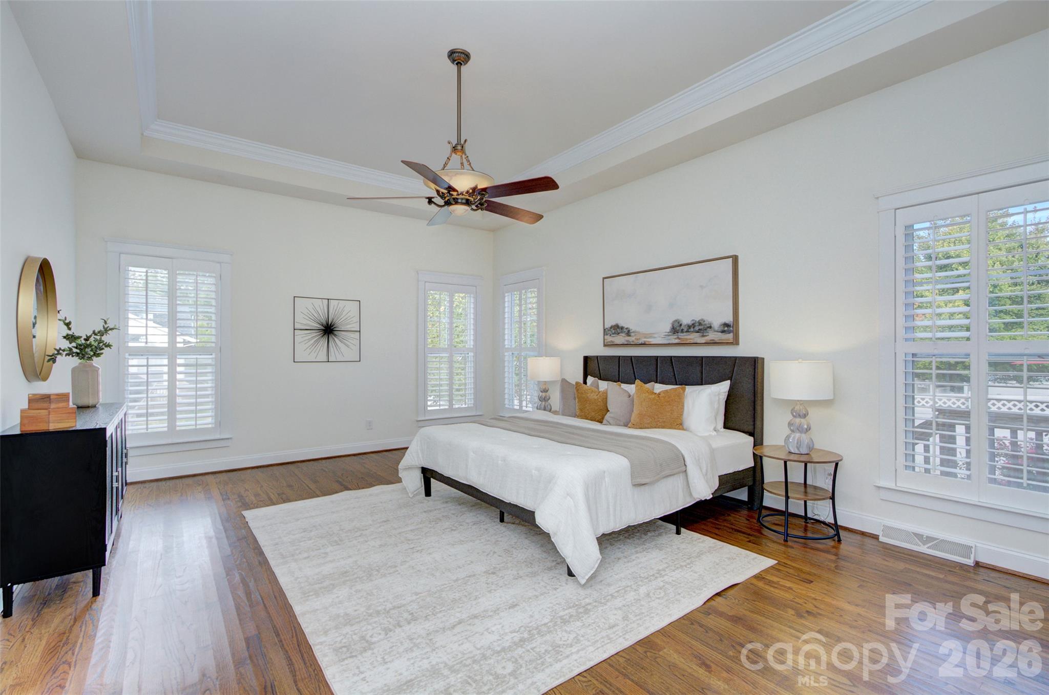 Primary with beautiful hardwoods & plantation shutters. - 16418 Spruell Street, Huntersville