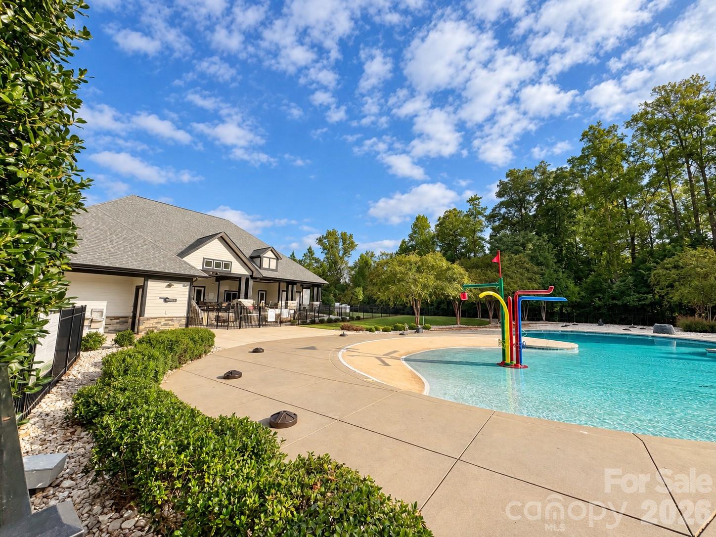 One of two community pools. Enjoy the children's pool and splash pad. - 8149 Merryvale Lane, Charlotte