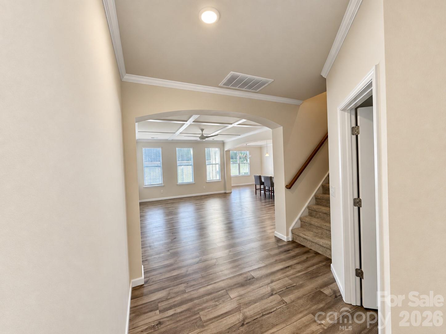 An inviting main floor filled with natural light. - 8149 Merryvale Lane, Charlotte