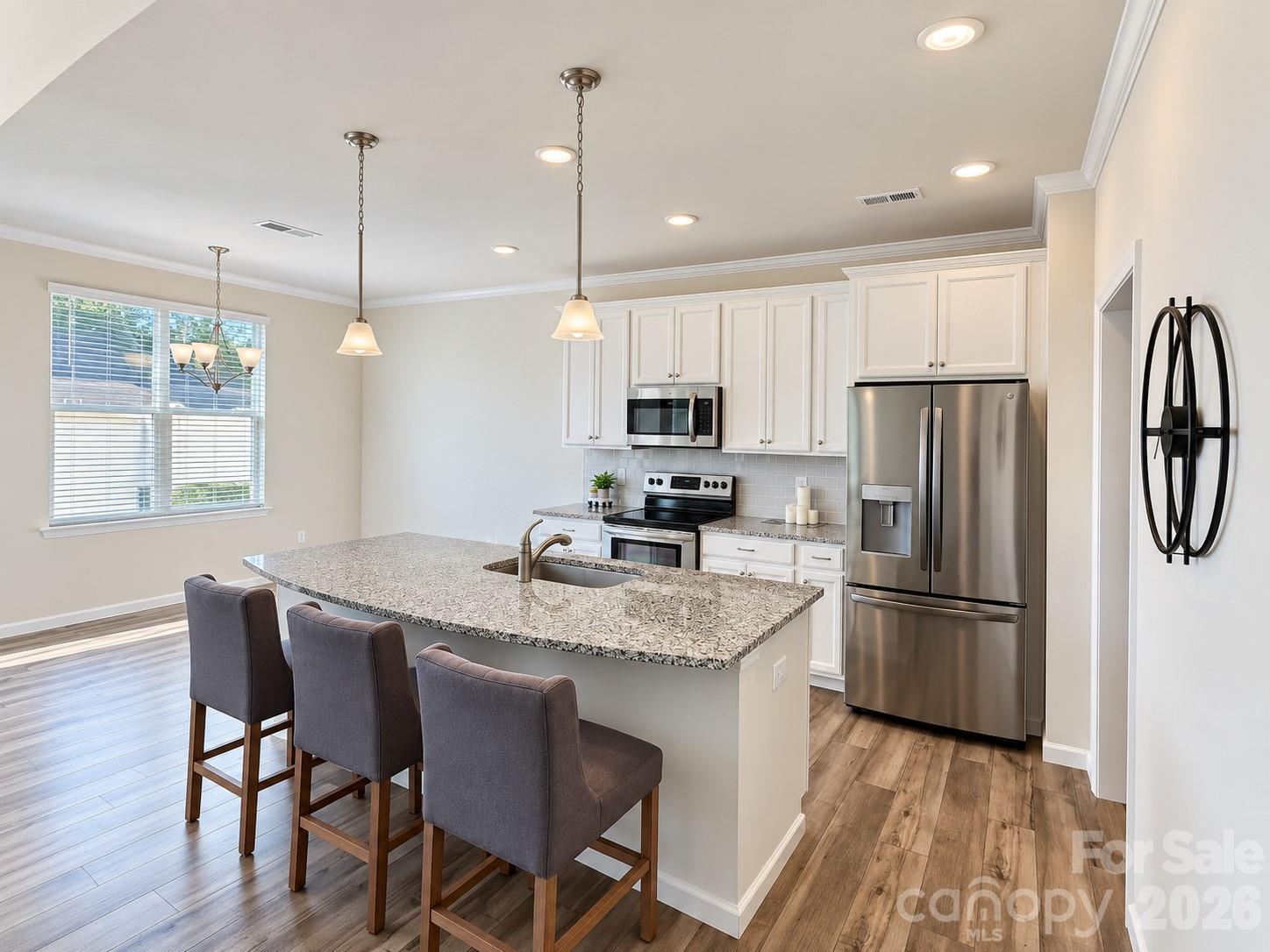 Spacious kitchen with quartz countertops. - 8149 Merryvale Lane, Charlotte