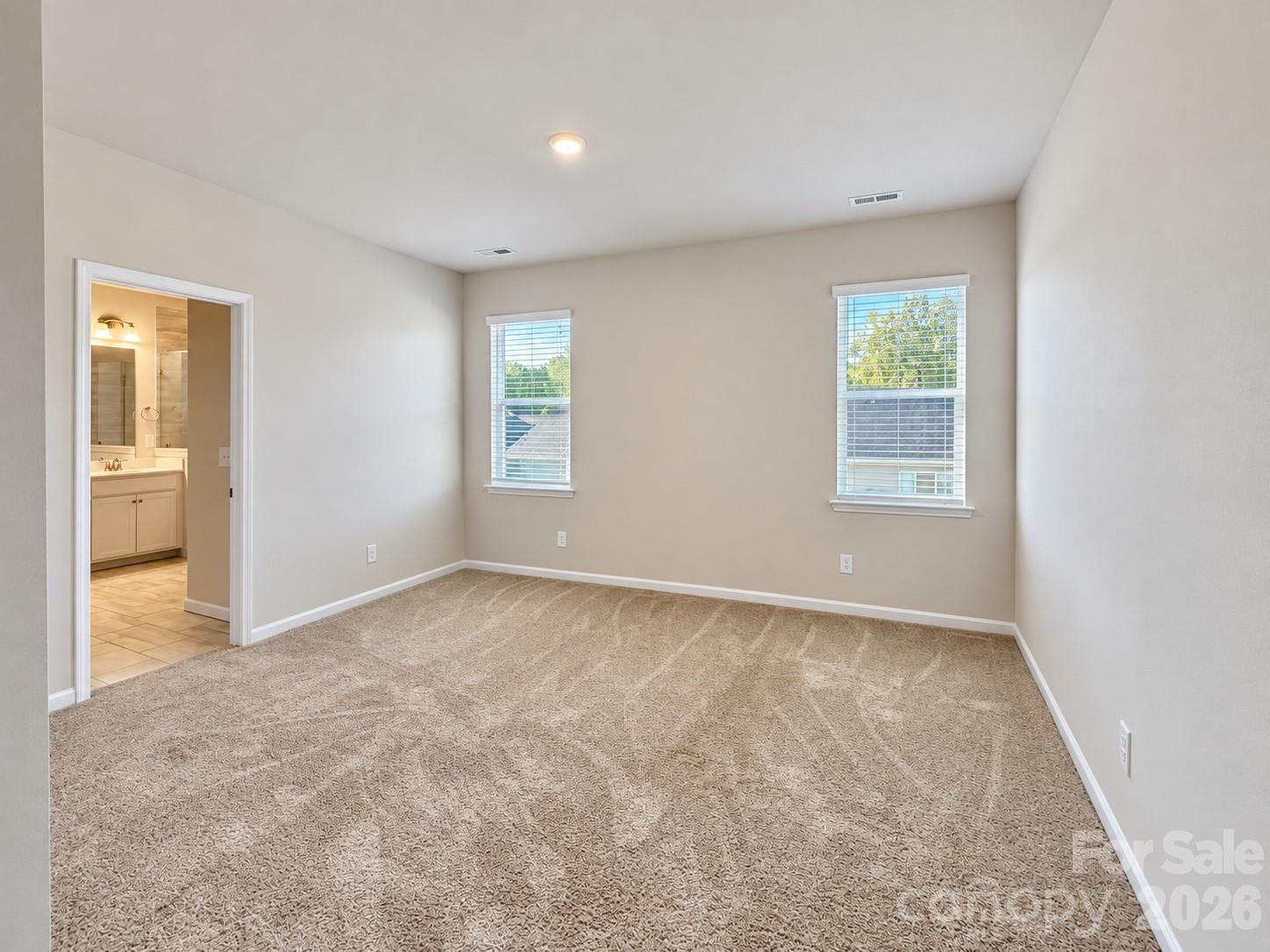 Primary bedroom retreat. - 8149 Merryvale Lane, Charlotte