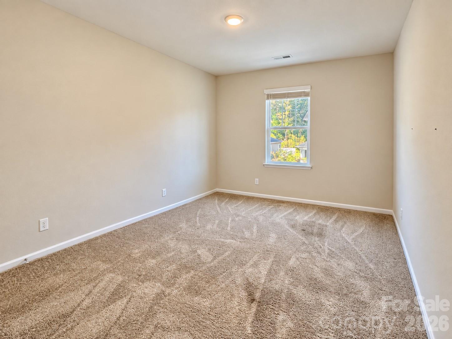 Second bedroom upstairs. Comfortable space for family or guests. - 8149 Merryvale Lane, Charlotte