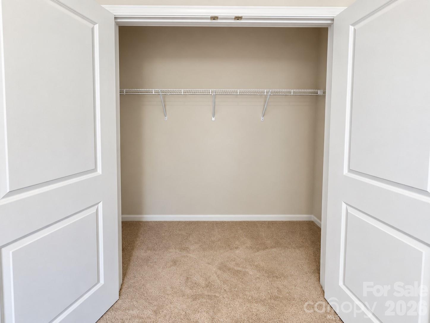 Spacious bedroom closet. Convenient storage to keep everything organized. - 8149 Merryvale Lane, Charlotte