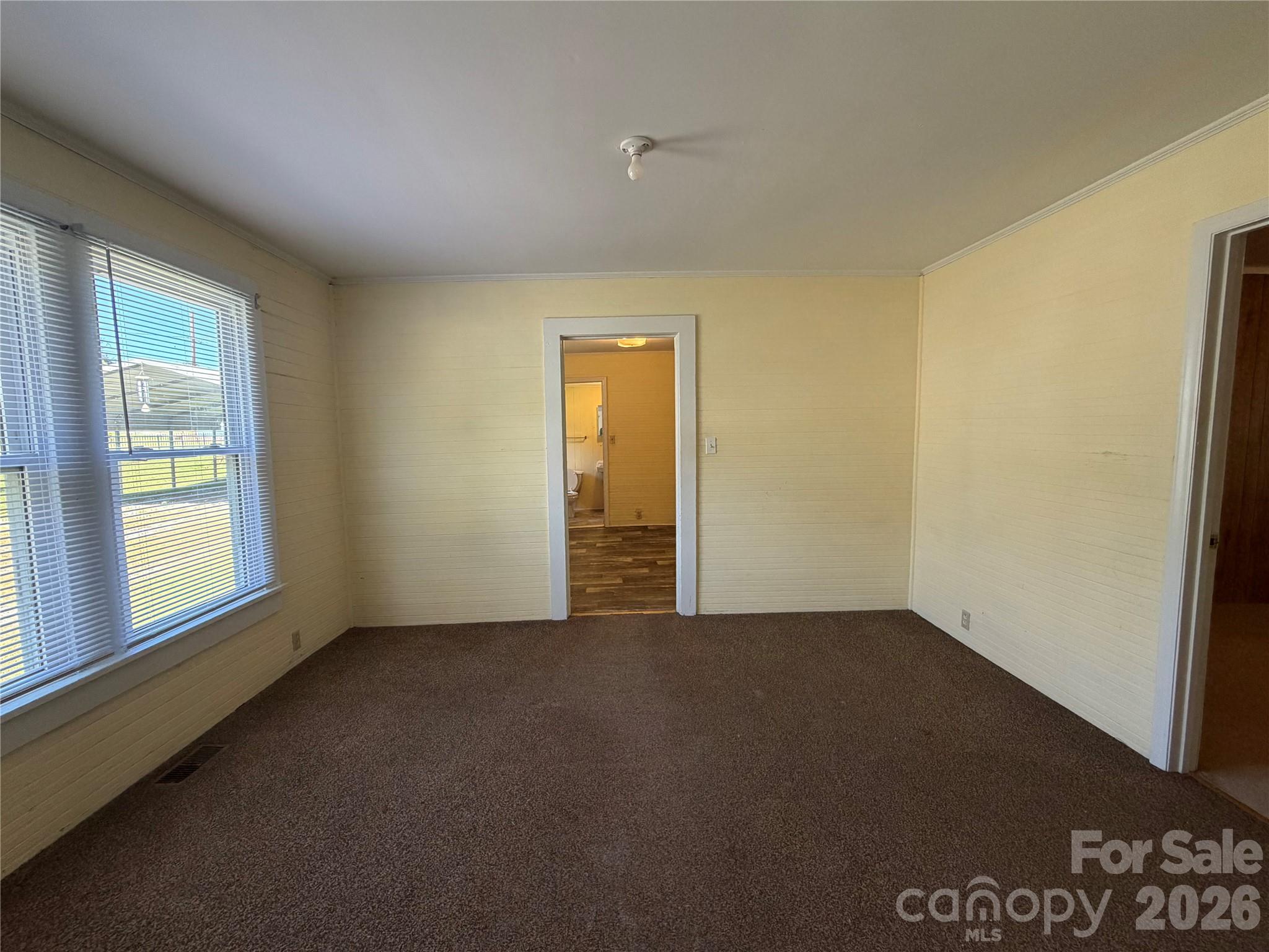 Middle room with bedroom 2 off to the right and kitchen at the back of the house - 509 Denver Street, Kannapolis