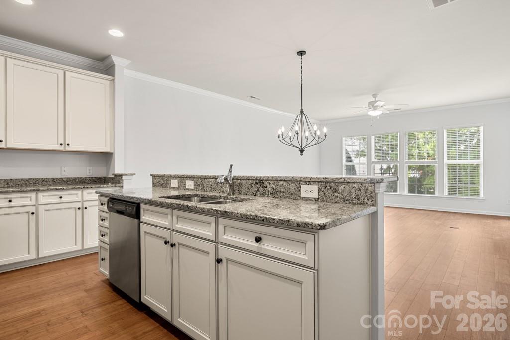 Kitchen overlooks the bright family room - 9018 Smokey Hill Lane, Indian Land