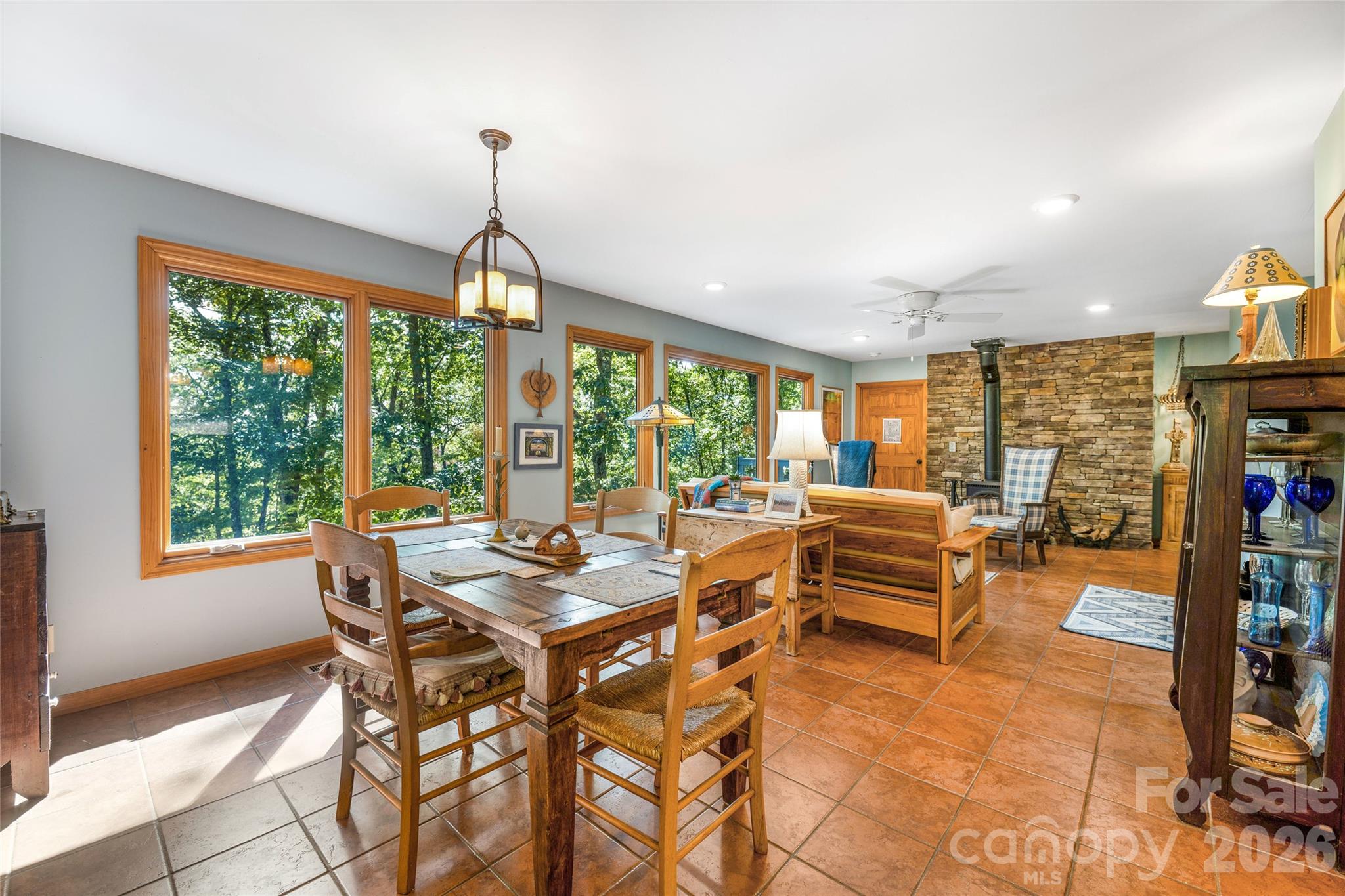 Dining area opens into the living room. - 115 Laurel Wood Drive, Mars Hill