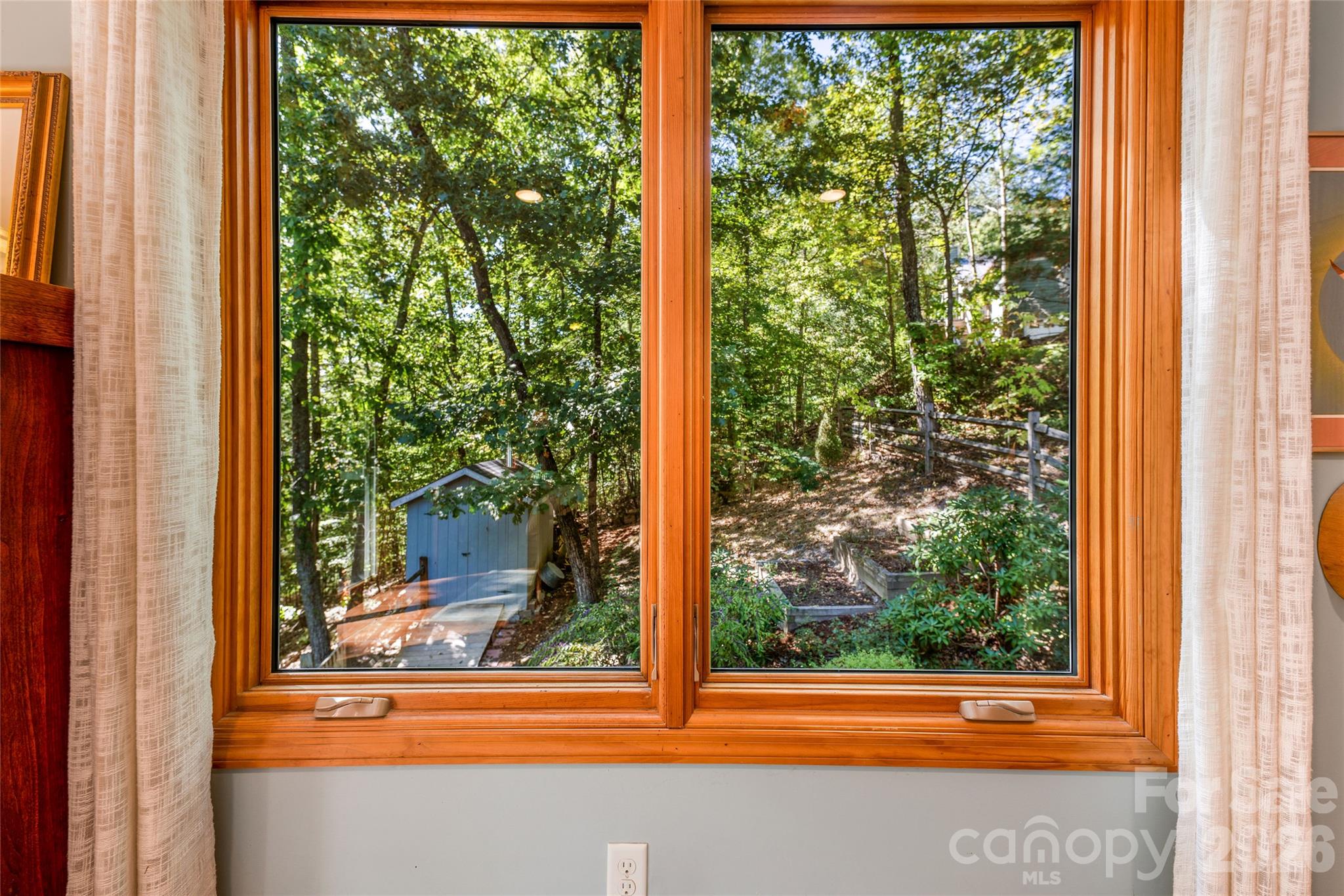 Lovely forest view from primary bedroom. - 115 Laurel Wood Drive, Mars Hill