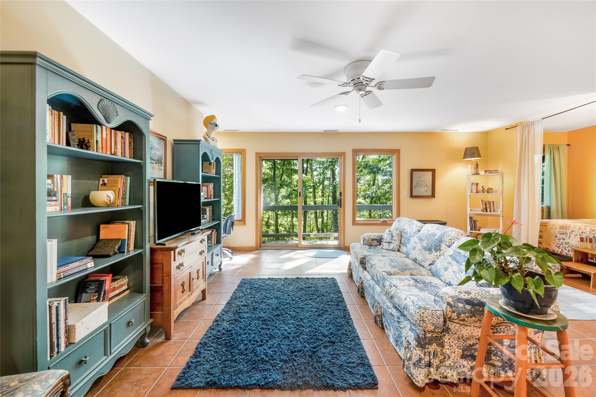 Family room with sleeping nook to the right. - 115 Laurel Wood Drive, Mars Hill