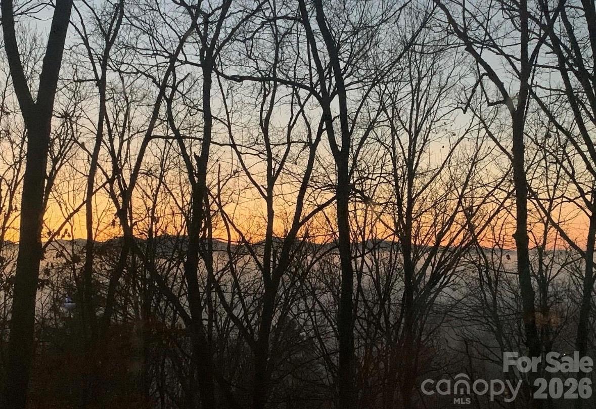 Another winter sunset from the living room. - 115 Laurel Wood Drive, Mars Hill