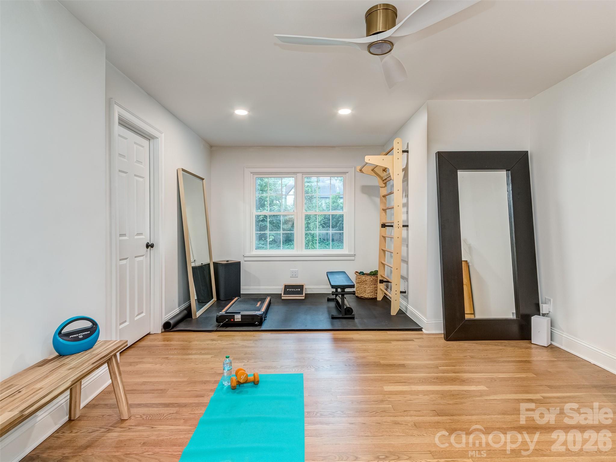 The 4th bedroom is currently being used as a fantastic home gym and is part of the expanded floorplan. The oversized closet would be the perfect spot for a full 3rd bathroom! - 6129 Page Court, Charlotte