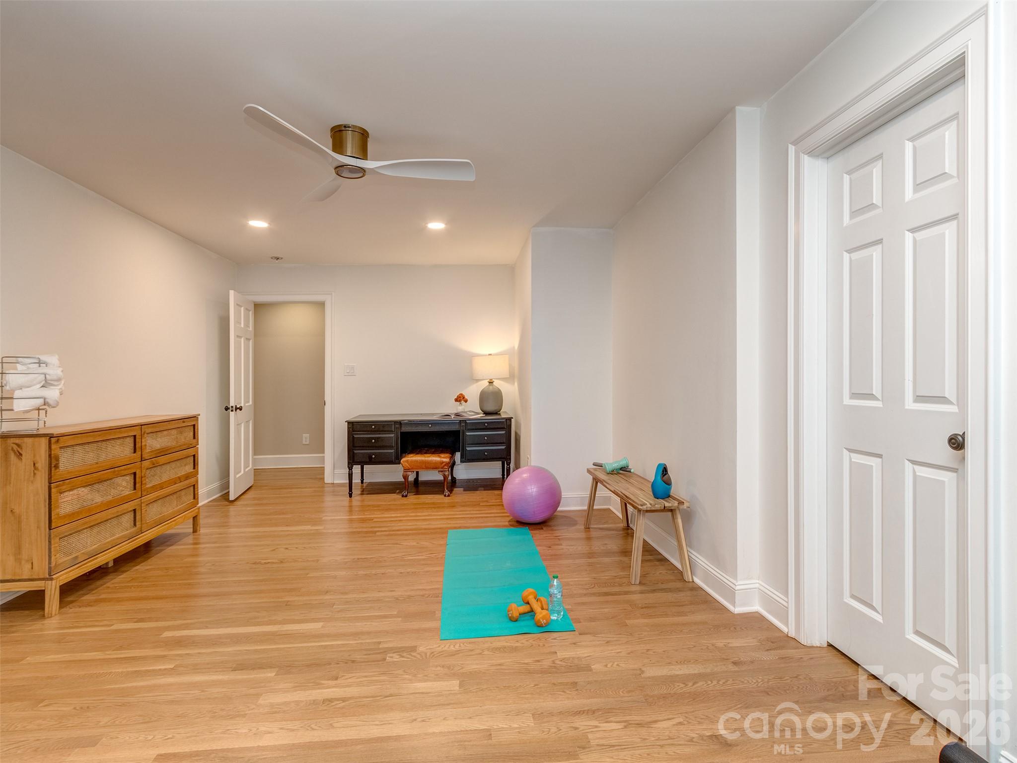The 4th bedroom is currently being used as a fantastic home gym and is part of the expanded floorplan. The oversized closet would be the perfect spot for a full 3rd bathroom! - 6129 Page Court, Charlotte