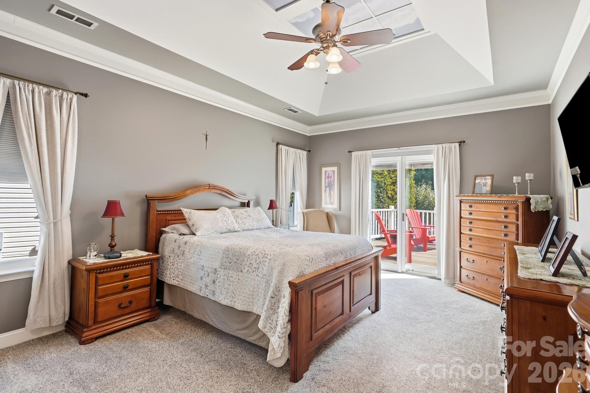 The primary bedroom has walk out access to the backyard pool area and has a pad that was built & wired for a future hot tub. - 120 Harris Farm Road, Mooresville
