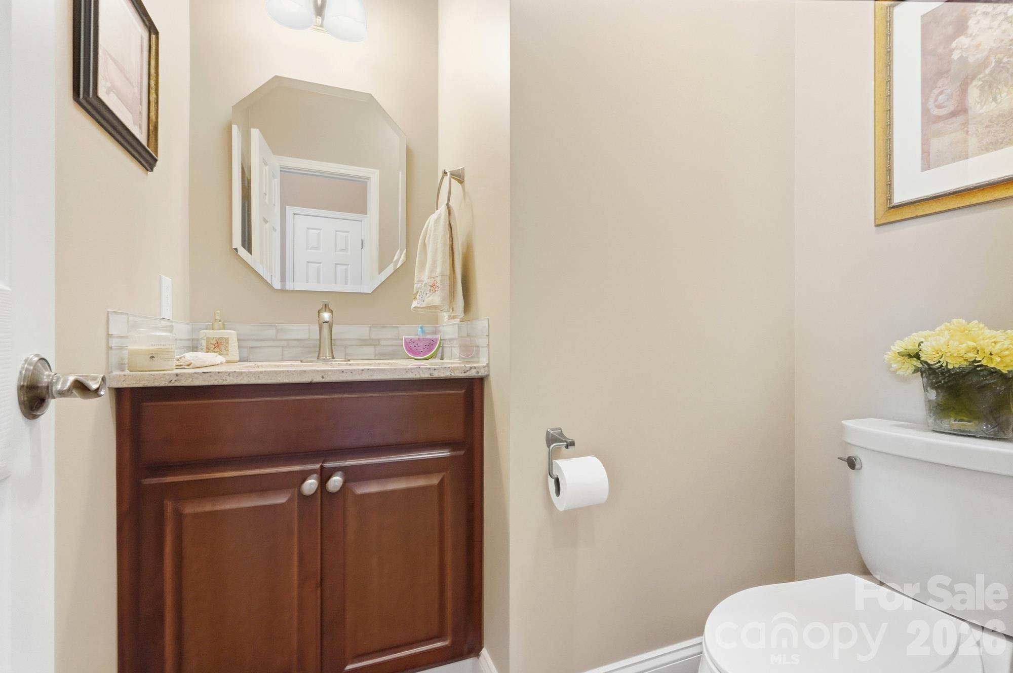 The main level half bath has been updated also! - 120 Harris Farm Road, Mooresville
