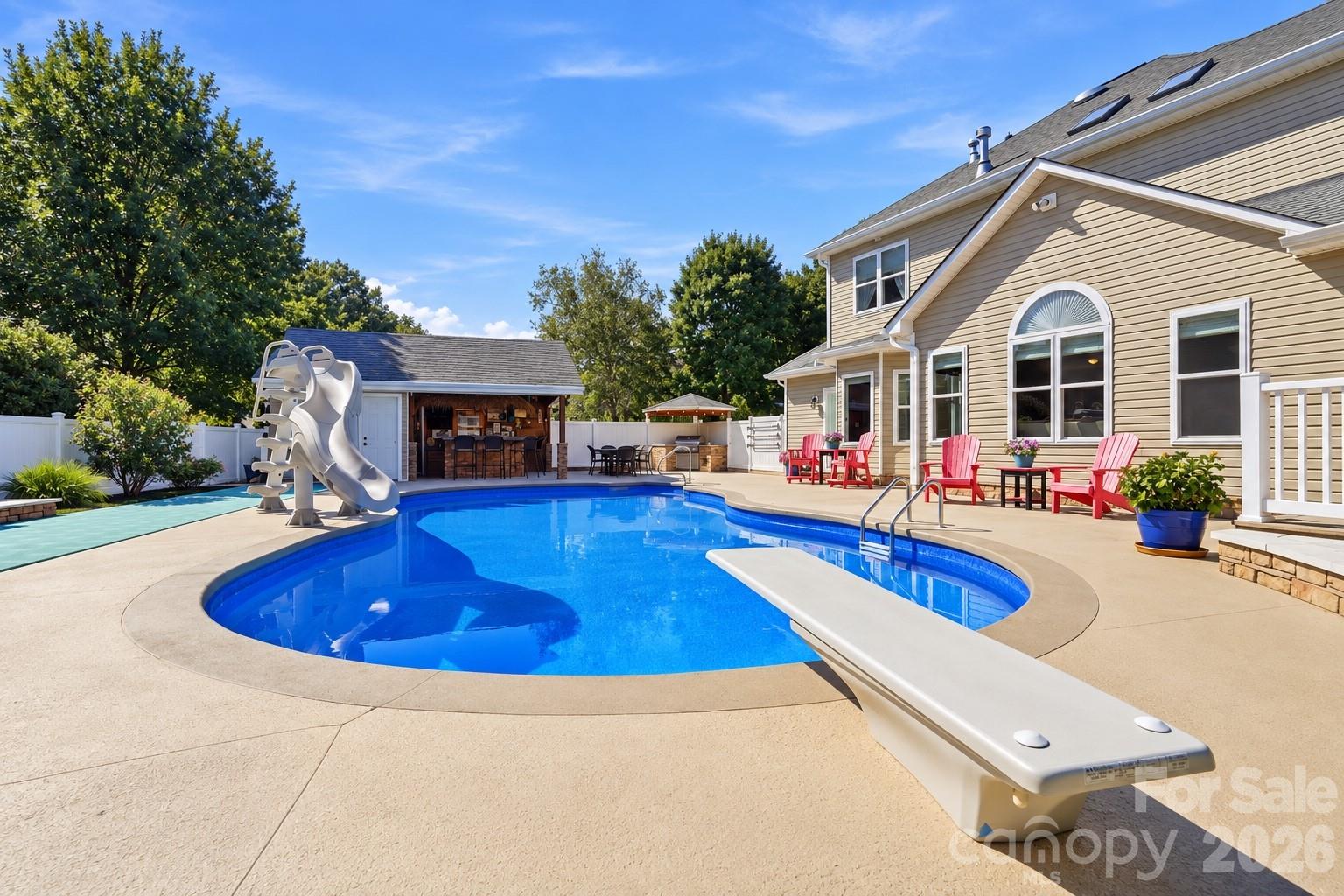 The pool is 25,000 gallons and has a deep end with diving board. - 120 Harris Farm Road, Mooresville