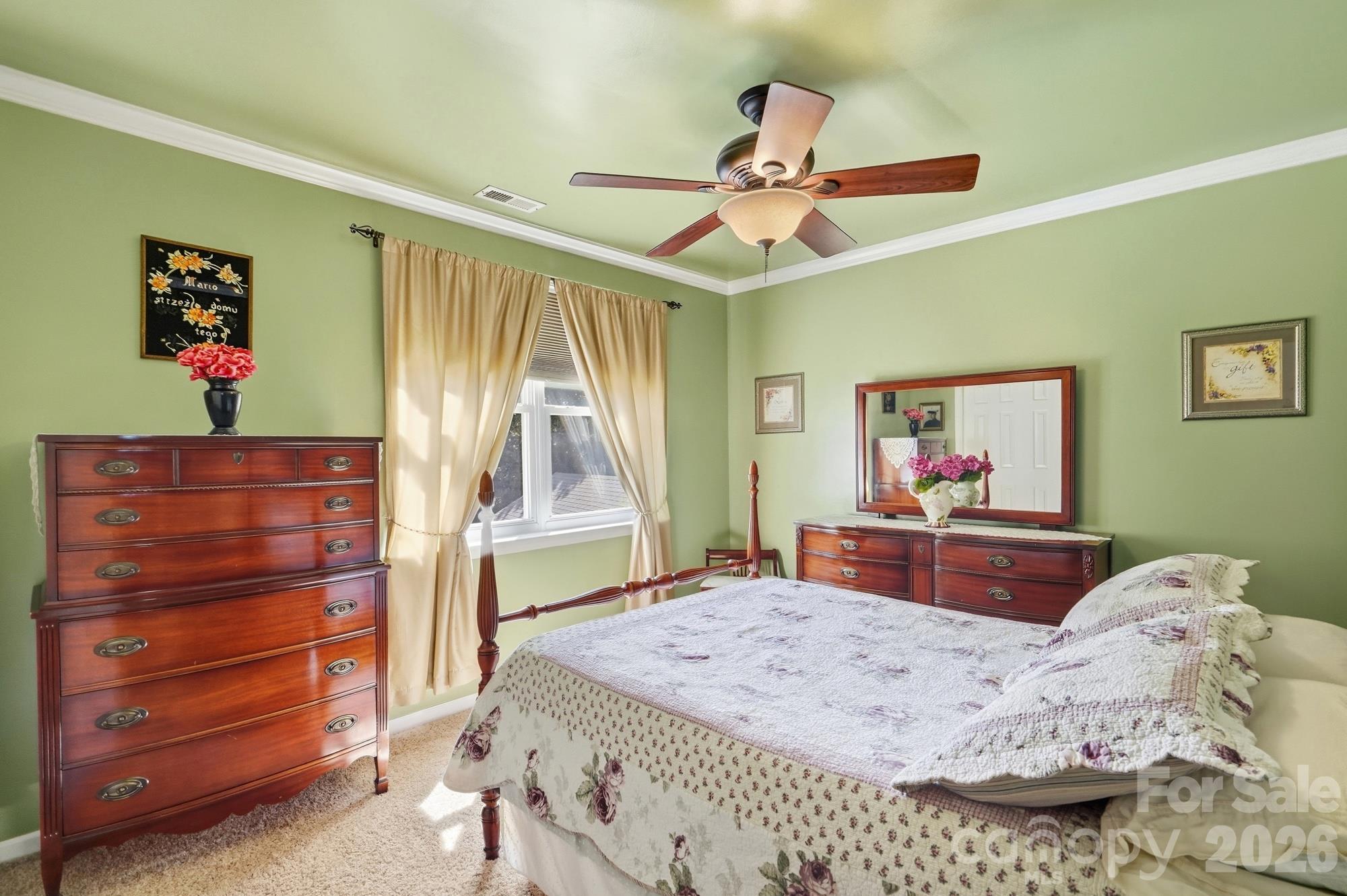 Secondary bedroom on the upper level overlooks the backyard pool area. - 120 Harris Farm Road, Mooresville