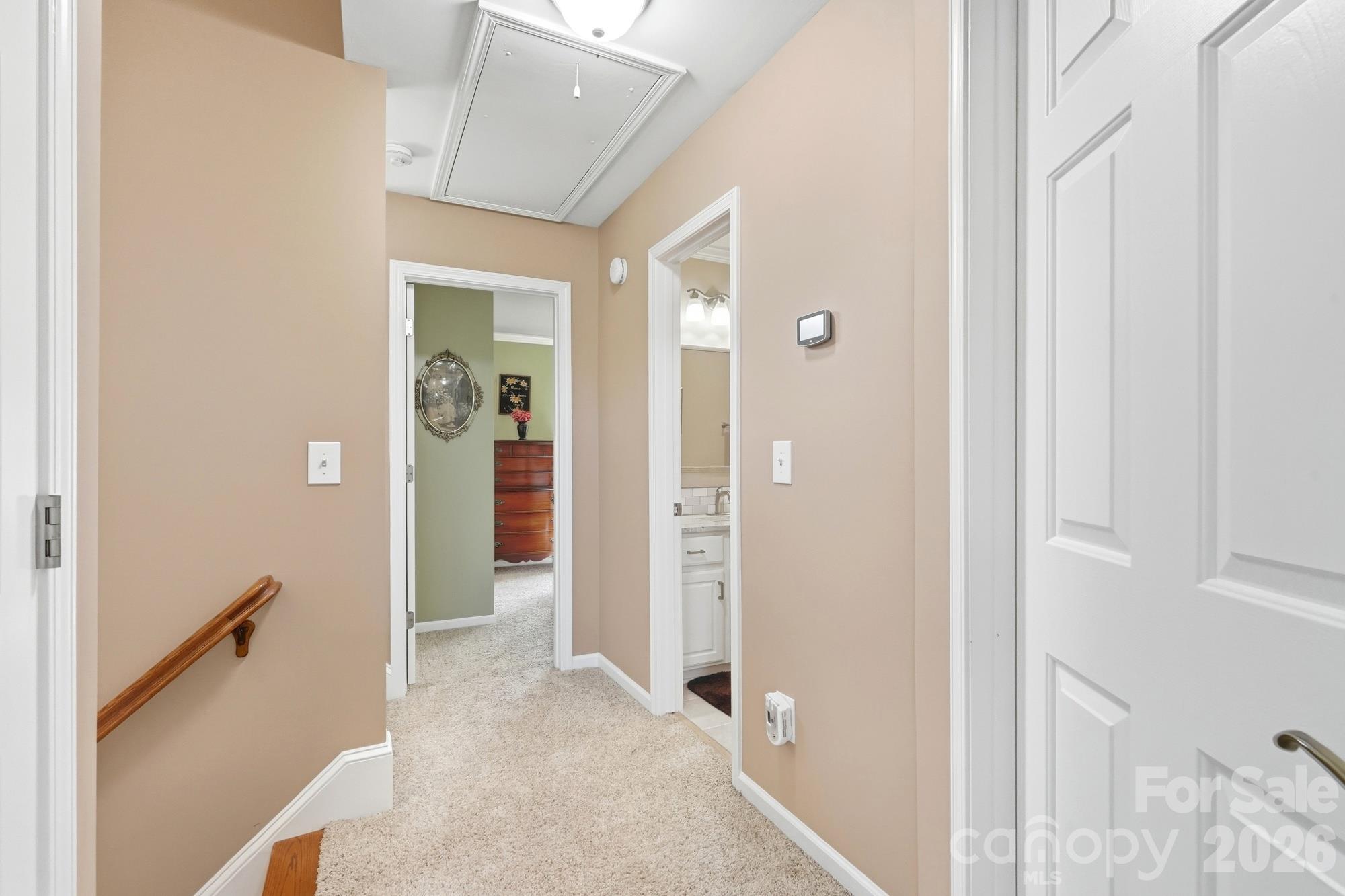 Upper level landing provides access to 3 more bedrooms and has a linen closet. - 120 Harris Farm Road, Mooresville